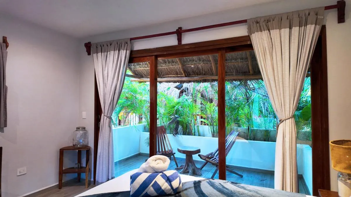 Queen Room with Garden View in Playa Canek Beachfront Eco Hotel