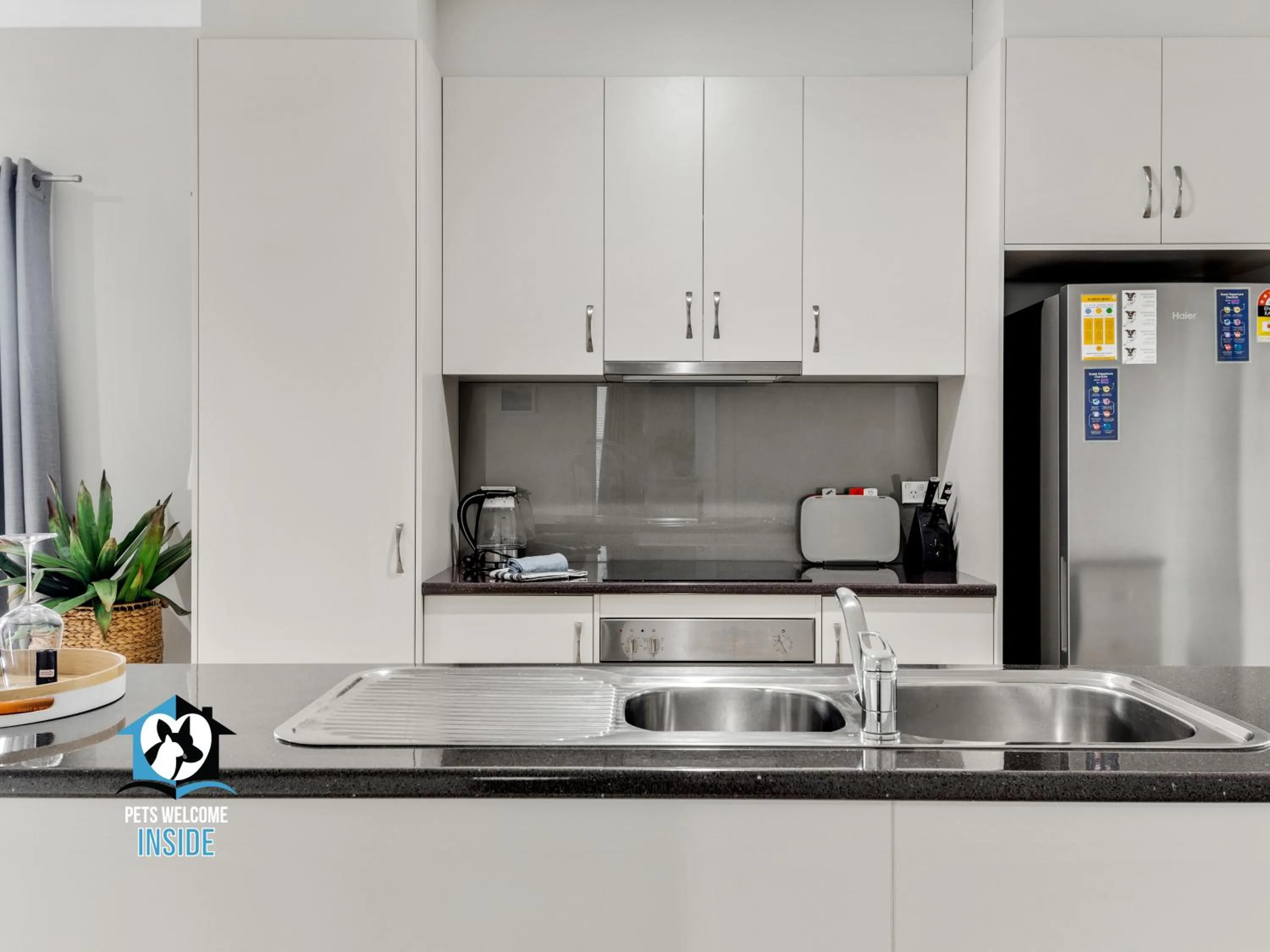 Communal kitchen in 3BR Contemporary Home with Sea Views