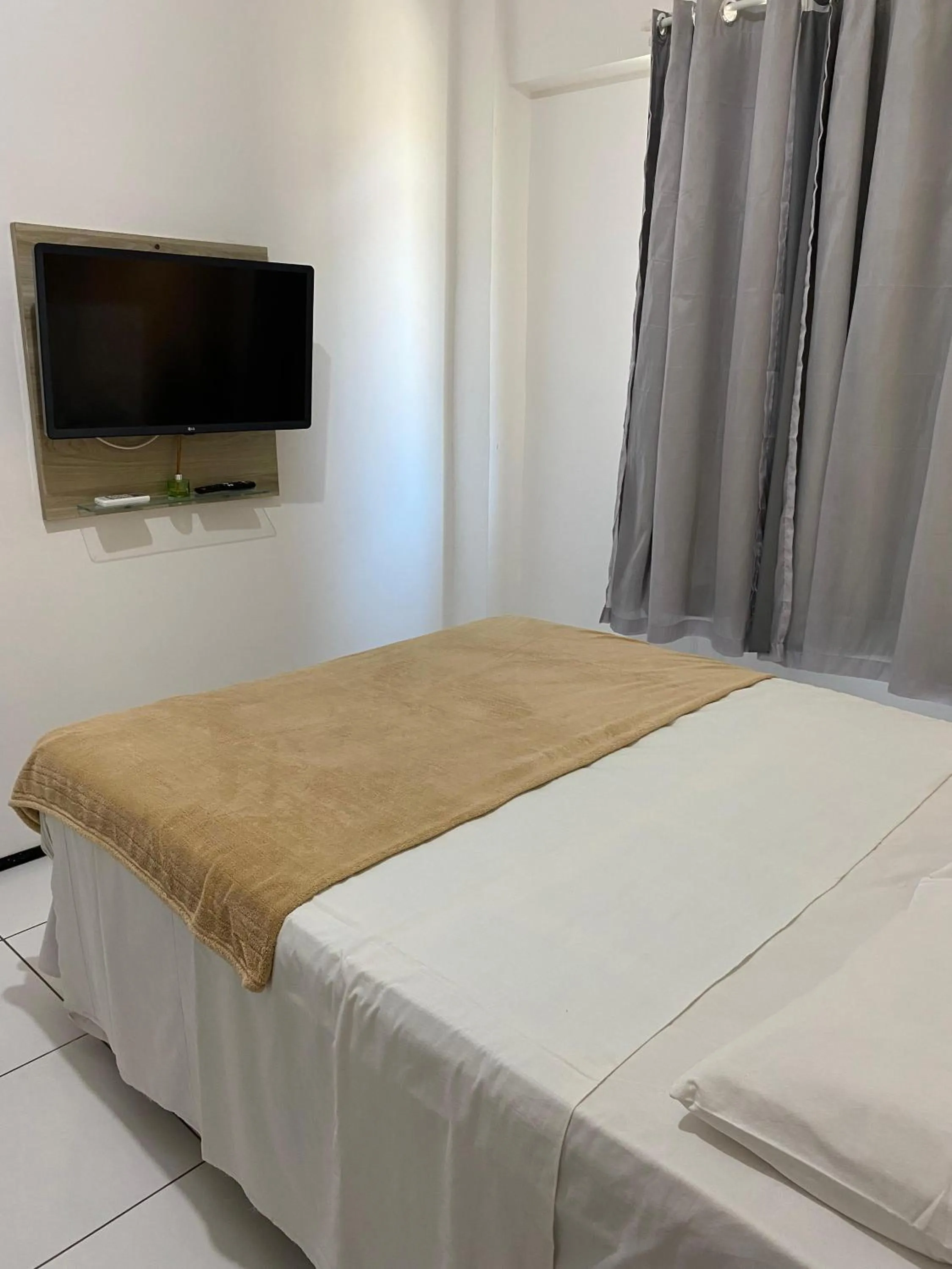 Bed in Brisa Brasil Residence