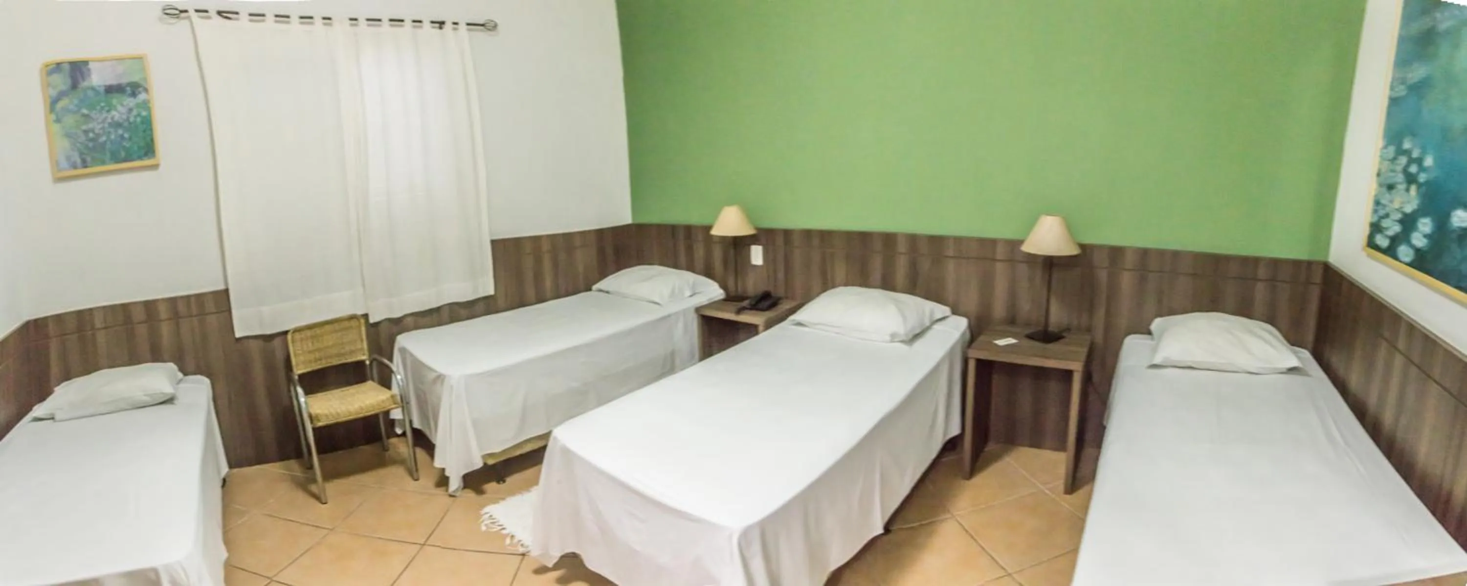 Bed in Samambaia Executive Hotel