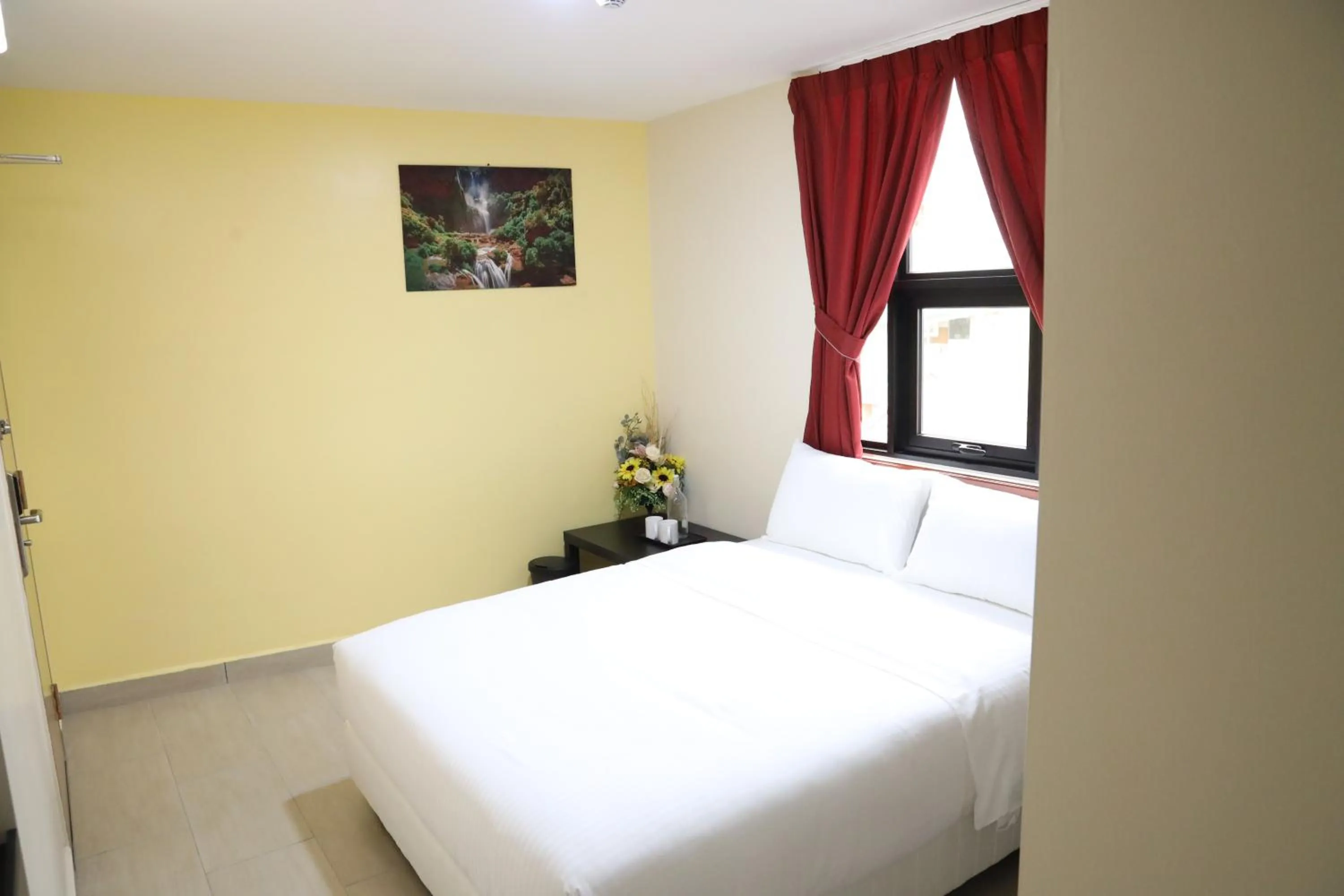 Bedroom, Bed in Capital O 90897 Island City Hotel