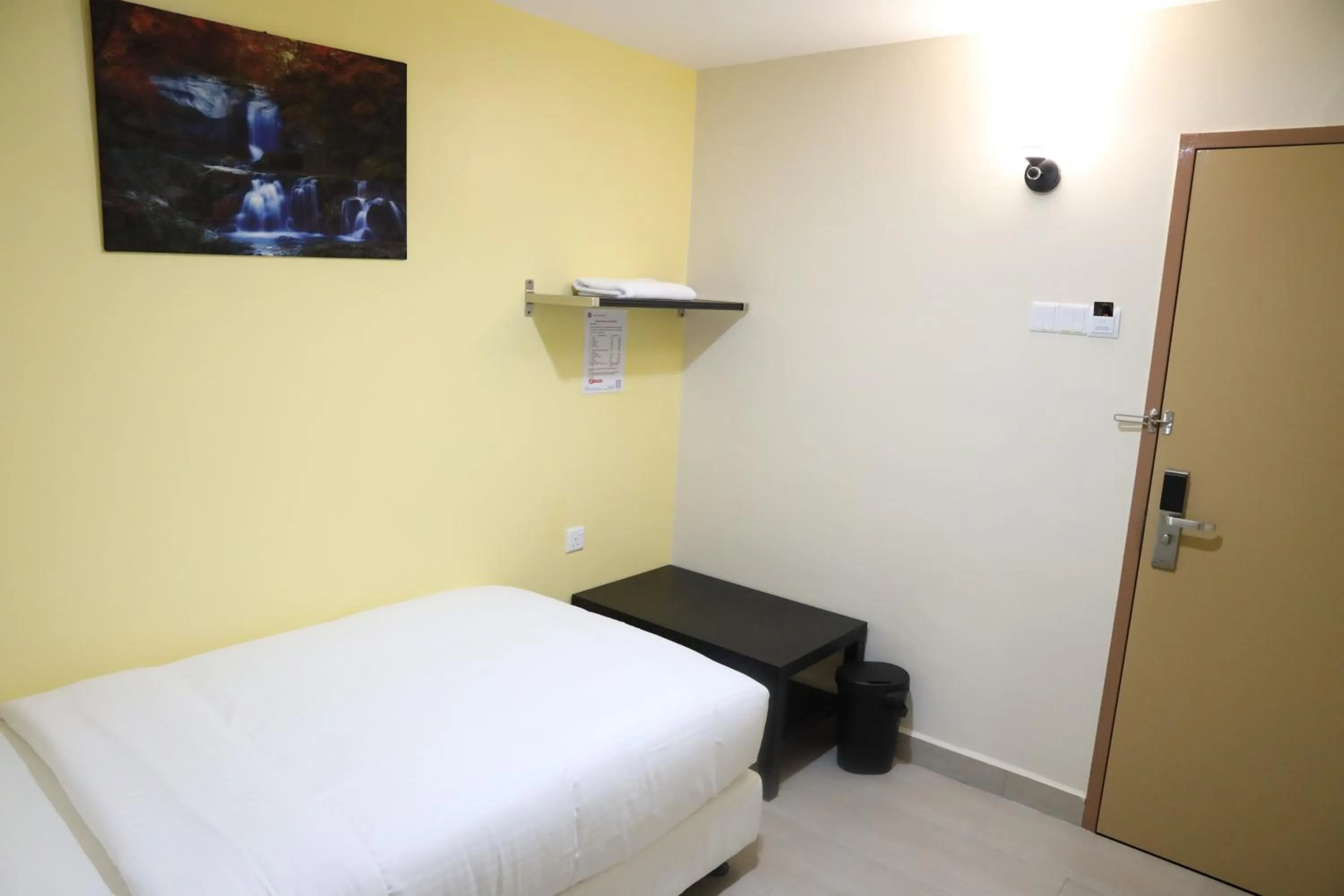 Bedroom, Bed in Capital O 90897 Island City Hotel