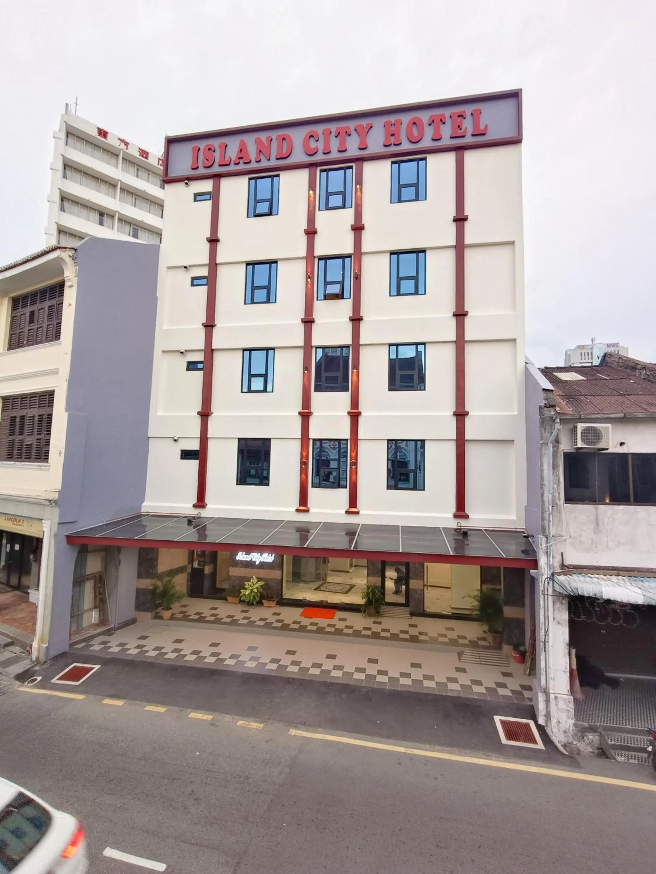 Facade/entrance in Capital O 90897 Island City Hotel