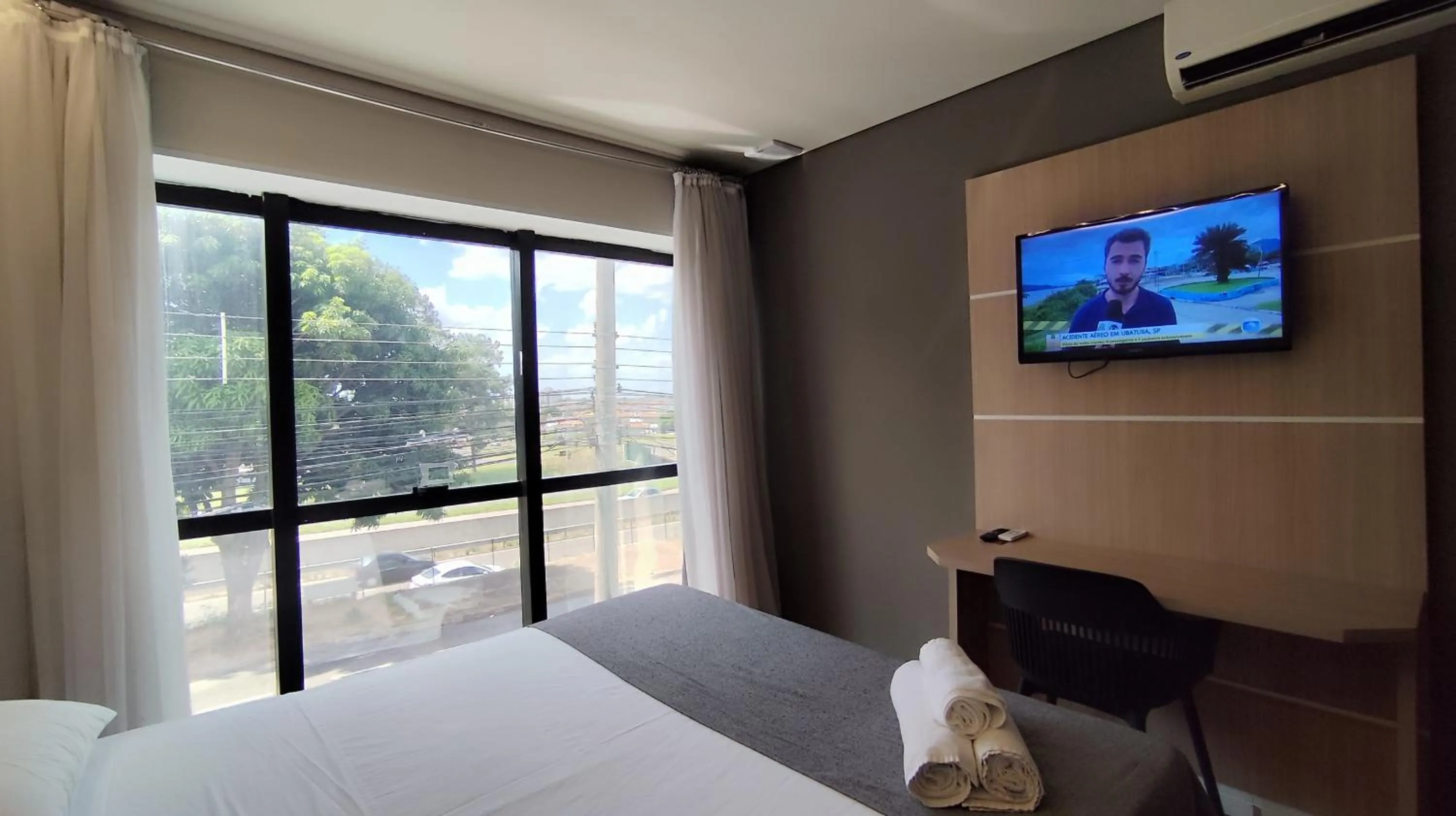 Bed in Assay Plaza Hotel