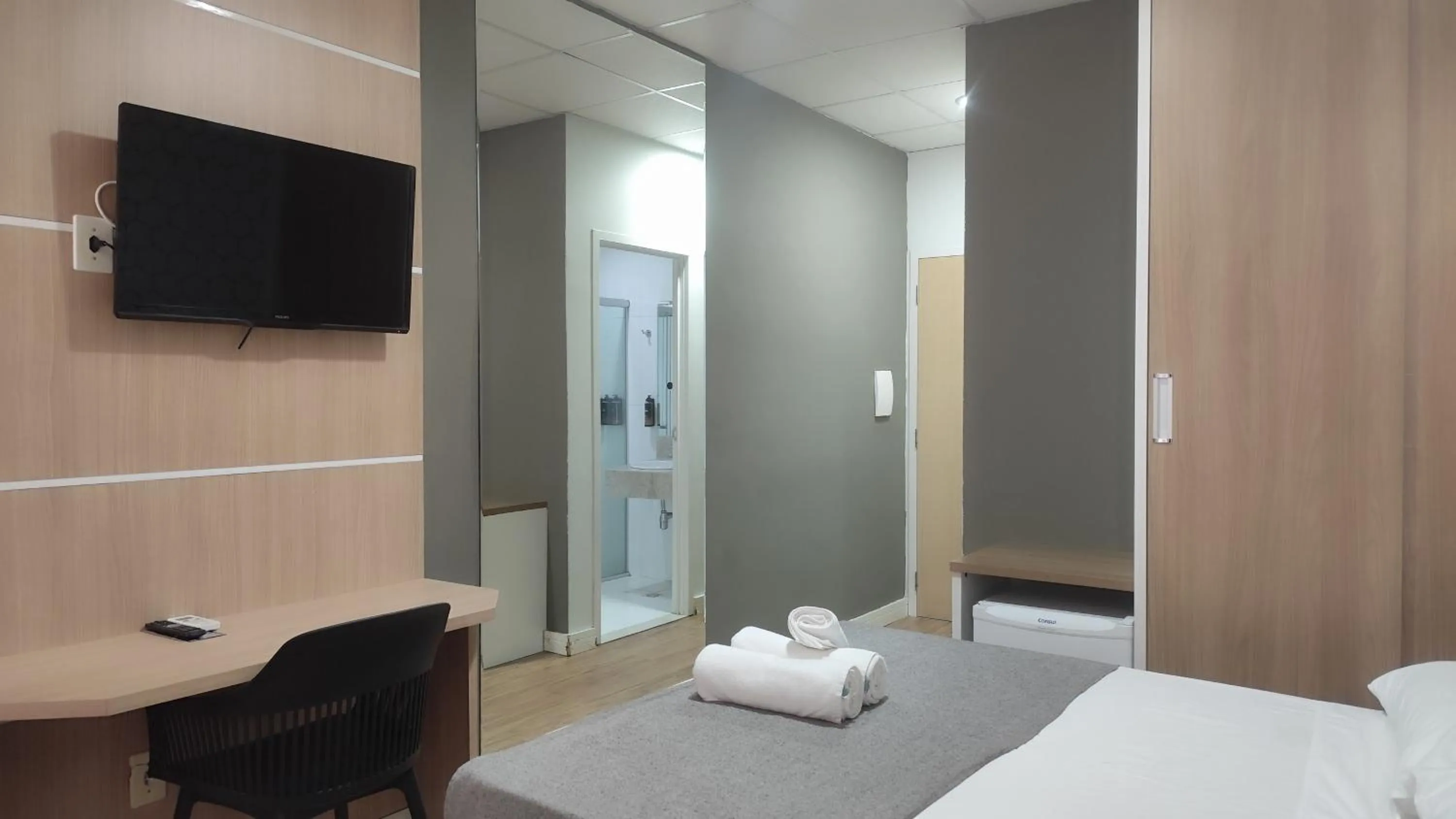 Bed in Assay Plaza Hotel