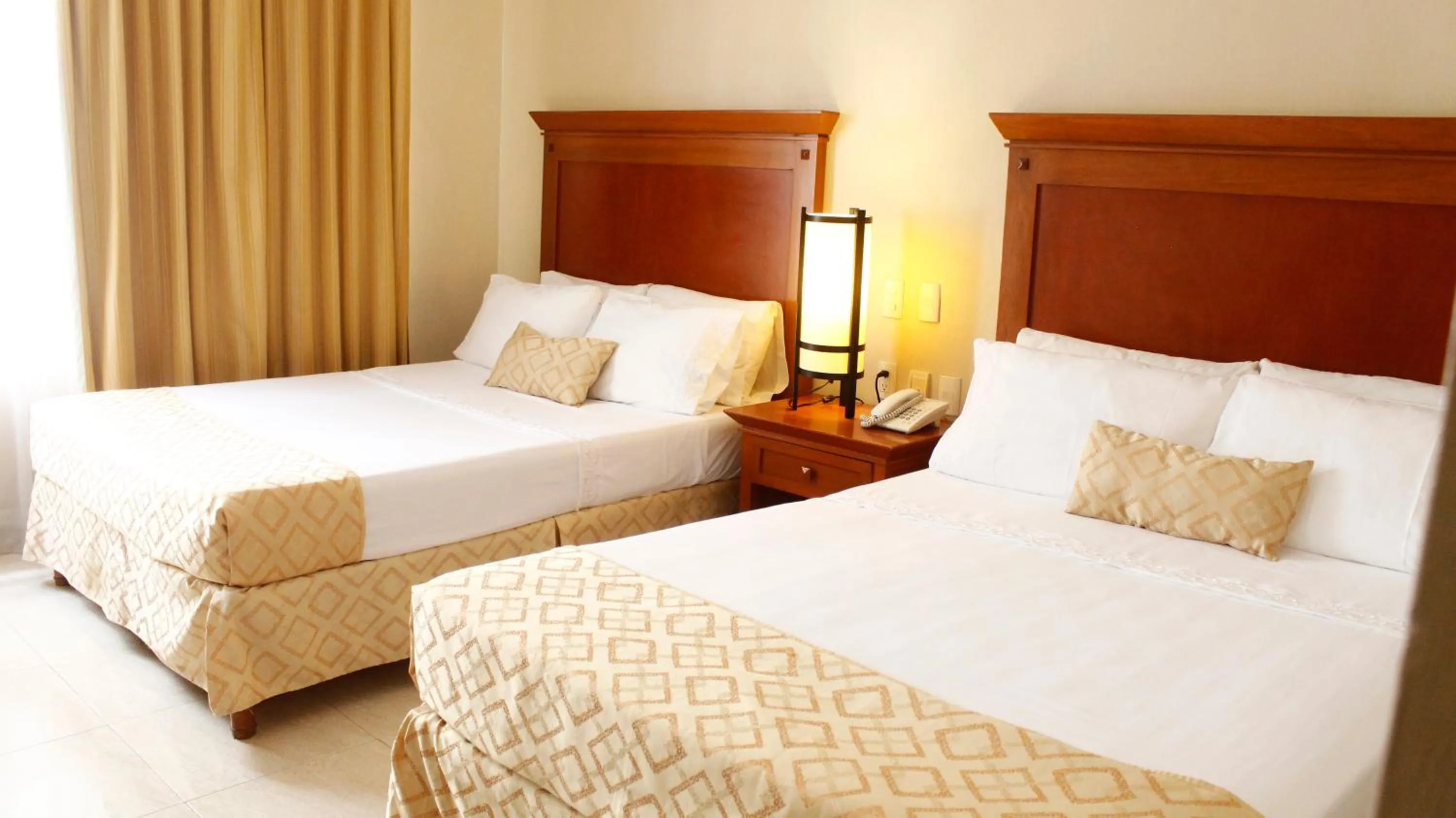 Bed in Hotel Magno Tepatitlán