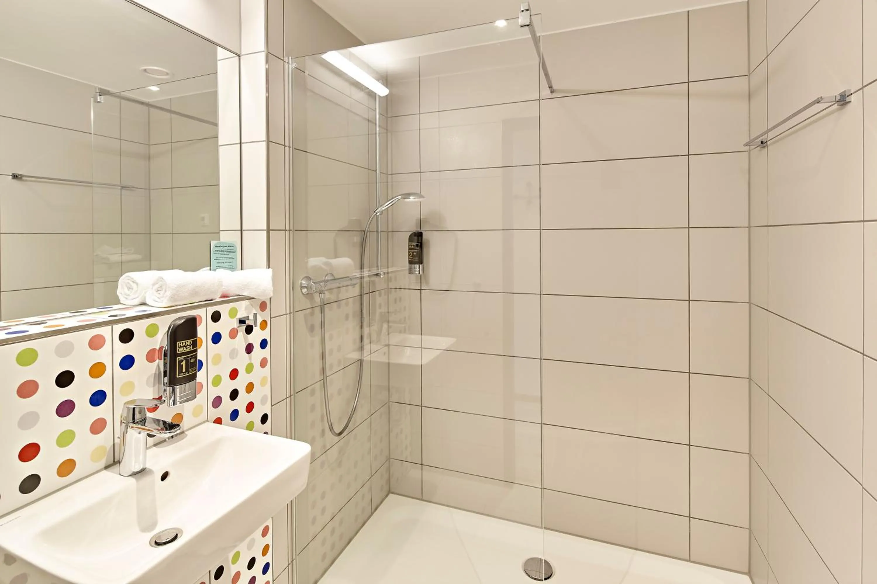 Bathroom in MEININGER Hotel Köln West