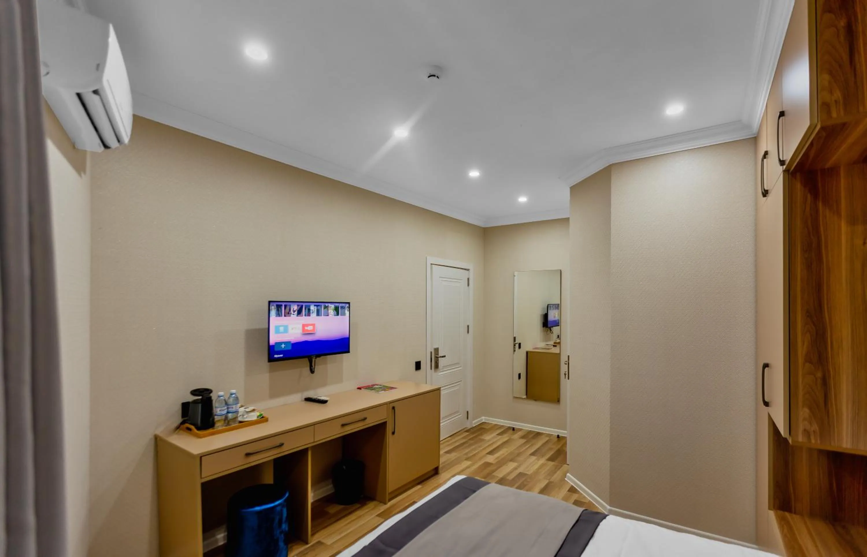 Bed in Hillside City Center Hotel