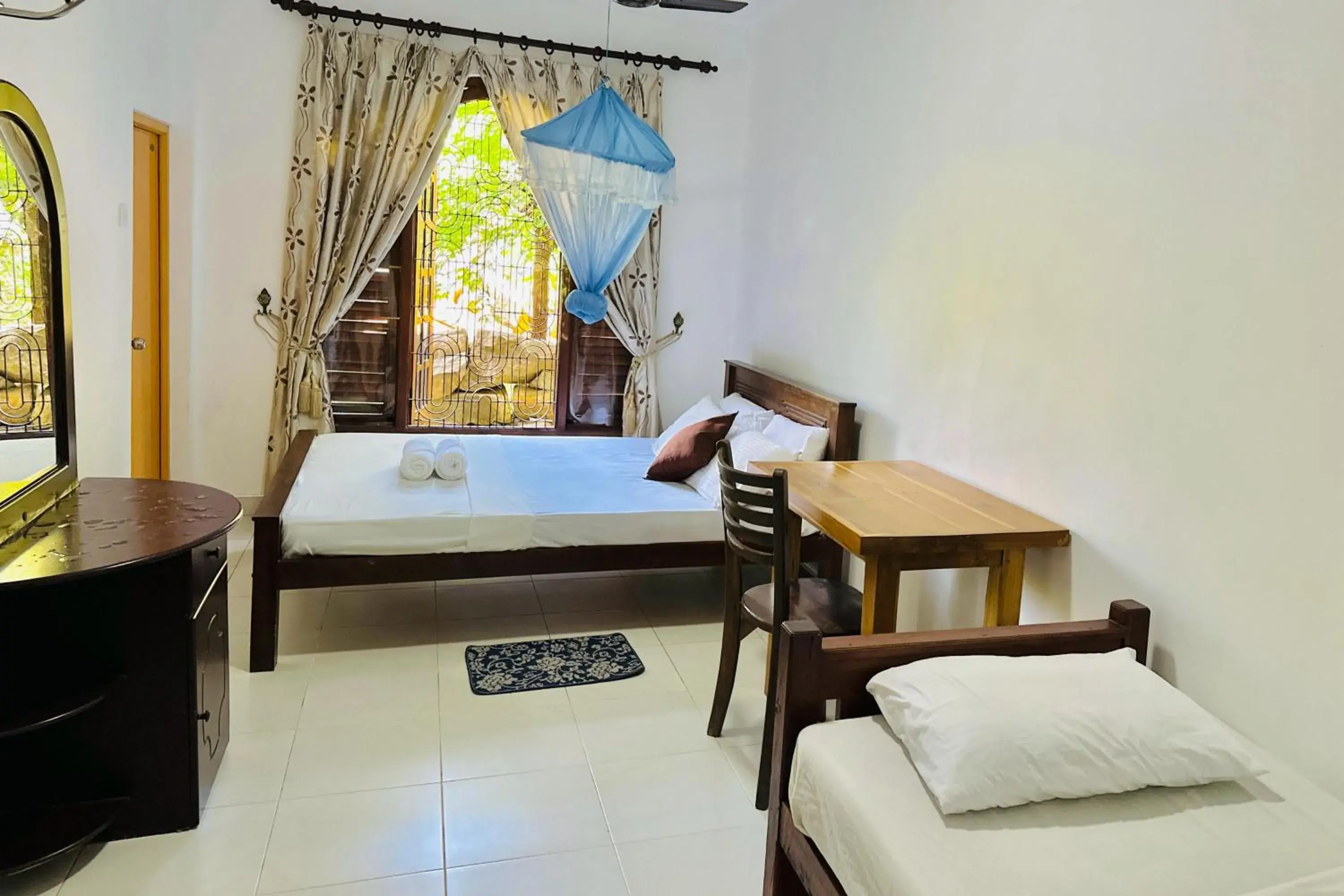 Triple Room in Gamagedara Resort Triple Room in Gamagedara Resort