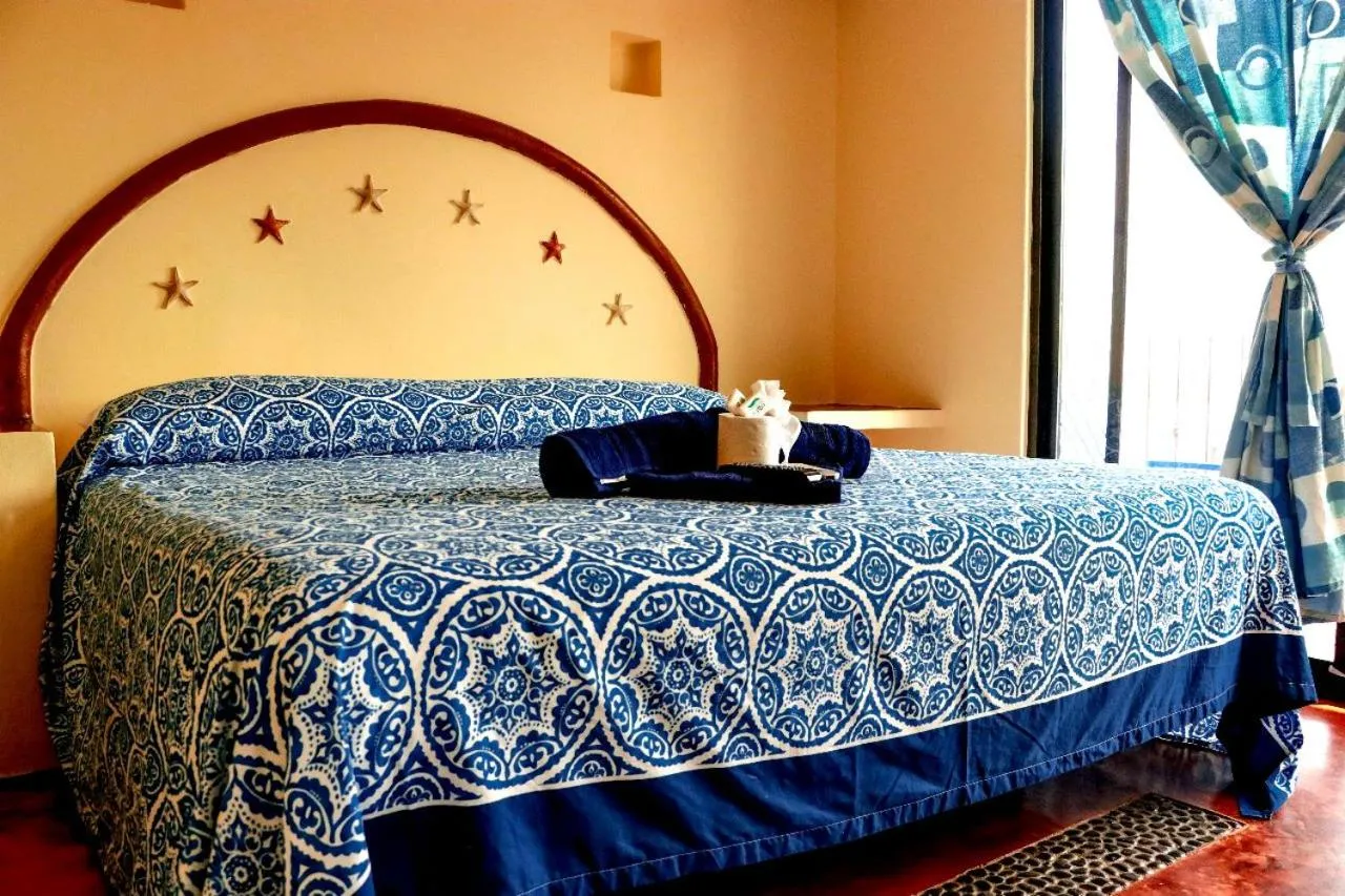 Bed in Hotel Rivera Del Mar