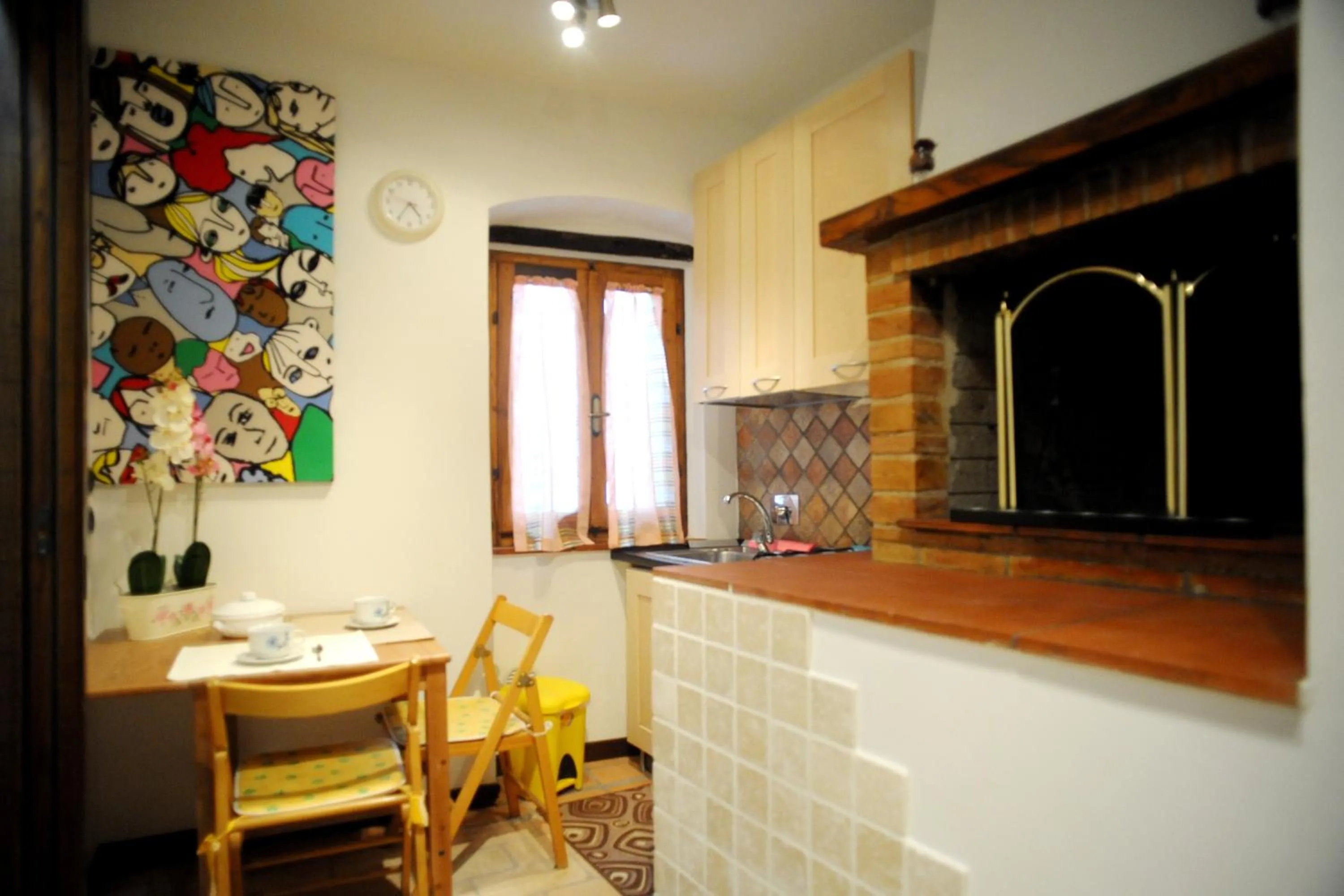 Kitchen or kitchenette in Appartamento Tulipano Rosa