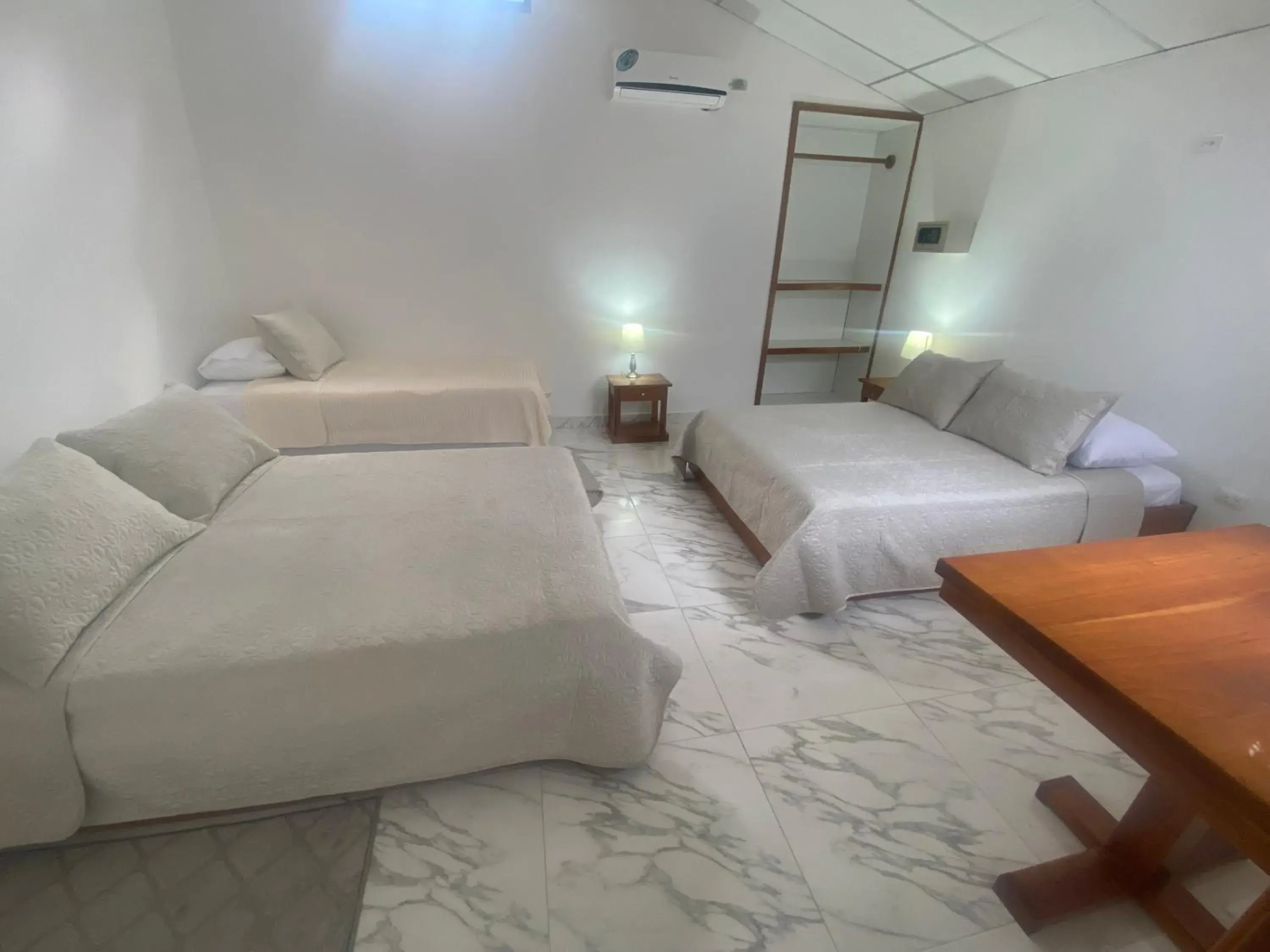 Quadruple Room in HOTEL AYRE By Baltra Quadruple Room in HOTEL AYRE By Baltra