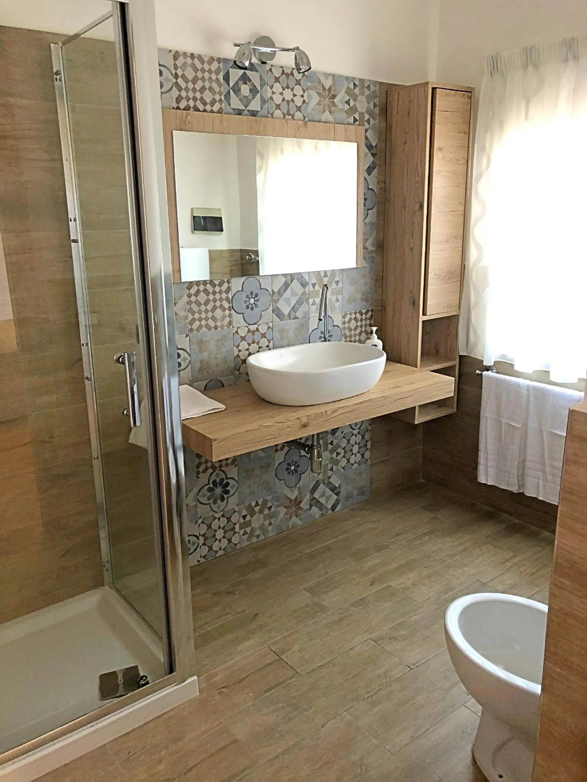 Bathroom in I Faraglioni Comfort Rooms