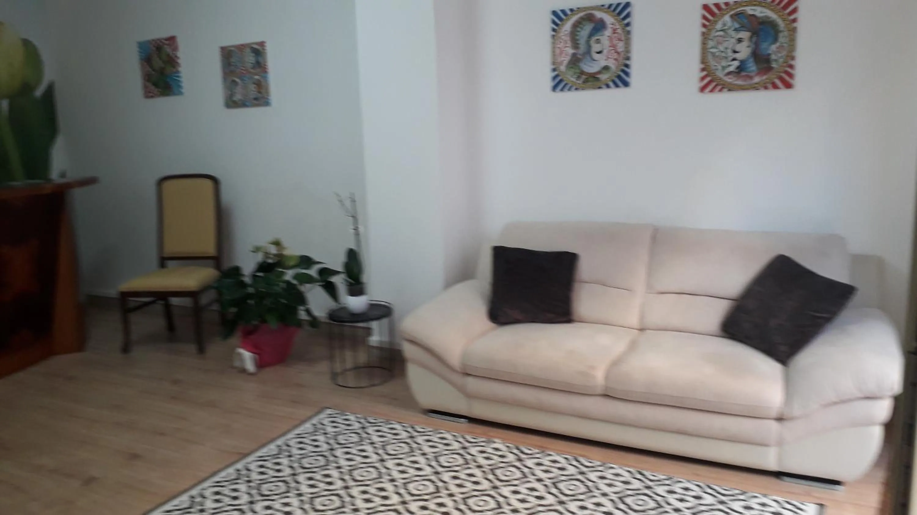 Seating area in I Faraglioni Comfort Rooms