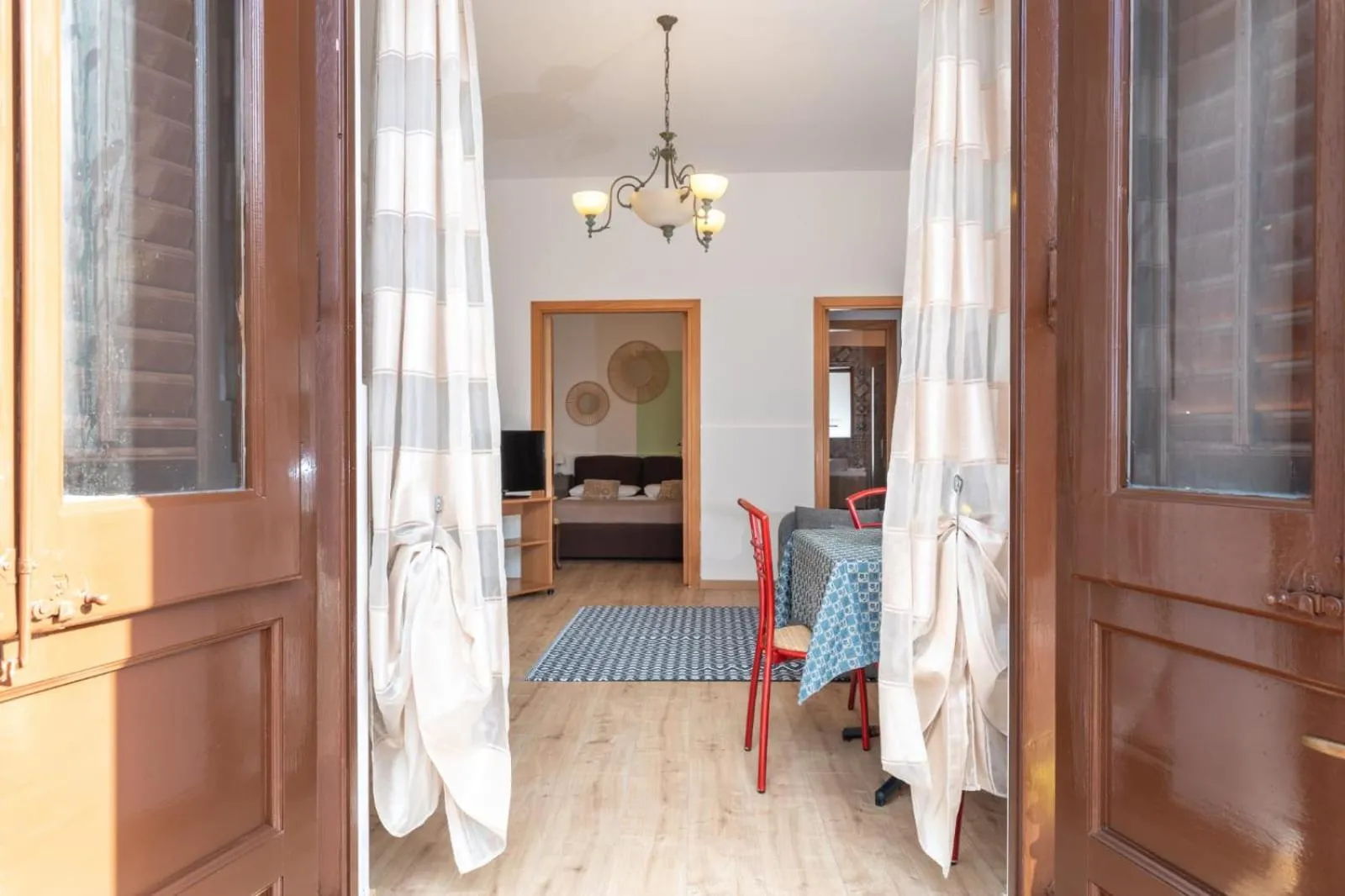 Bed in I Faraglioni Comfort Rooms
