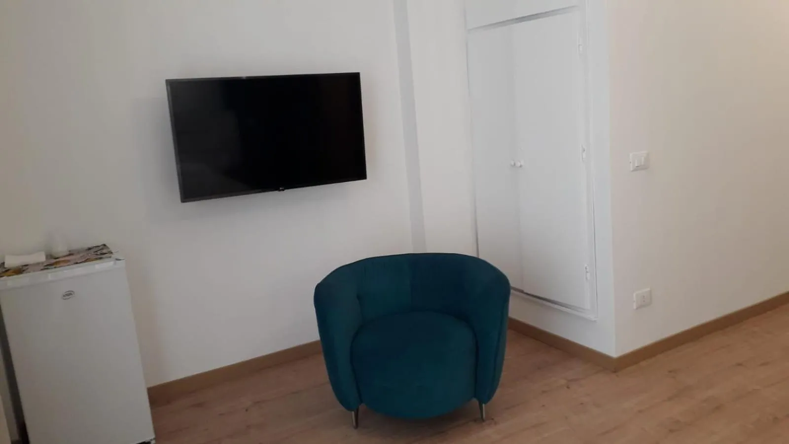 Seating area in I Faraglioni Comfort Rooms