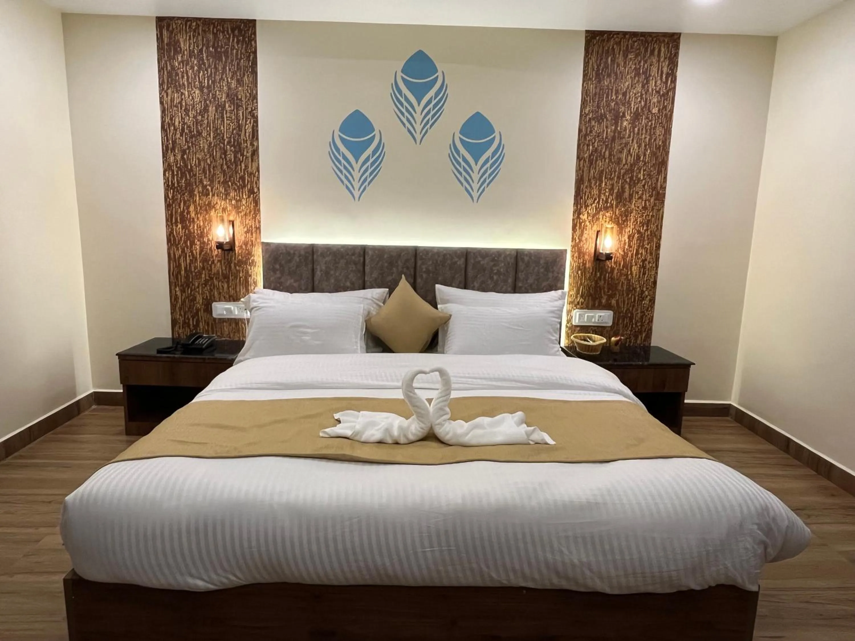 Bed in NIVEDAN HOTEL AND RESORT