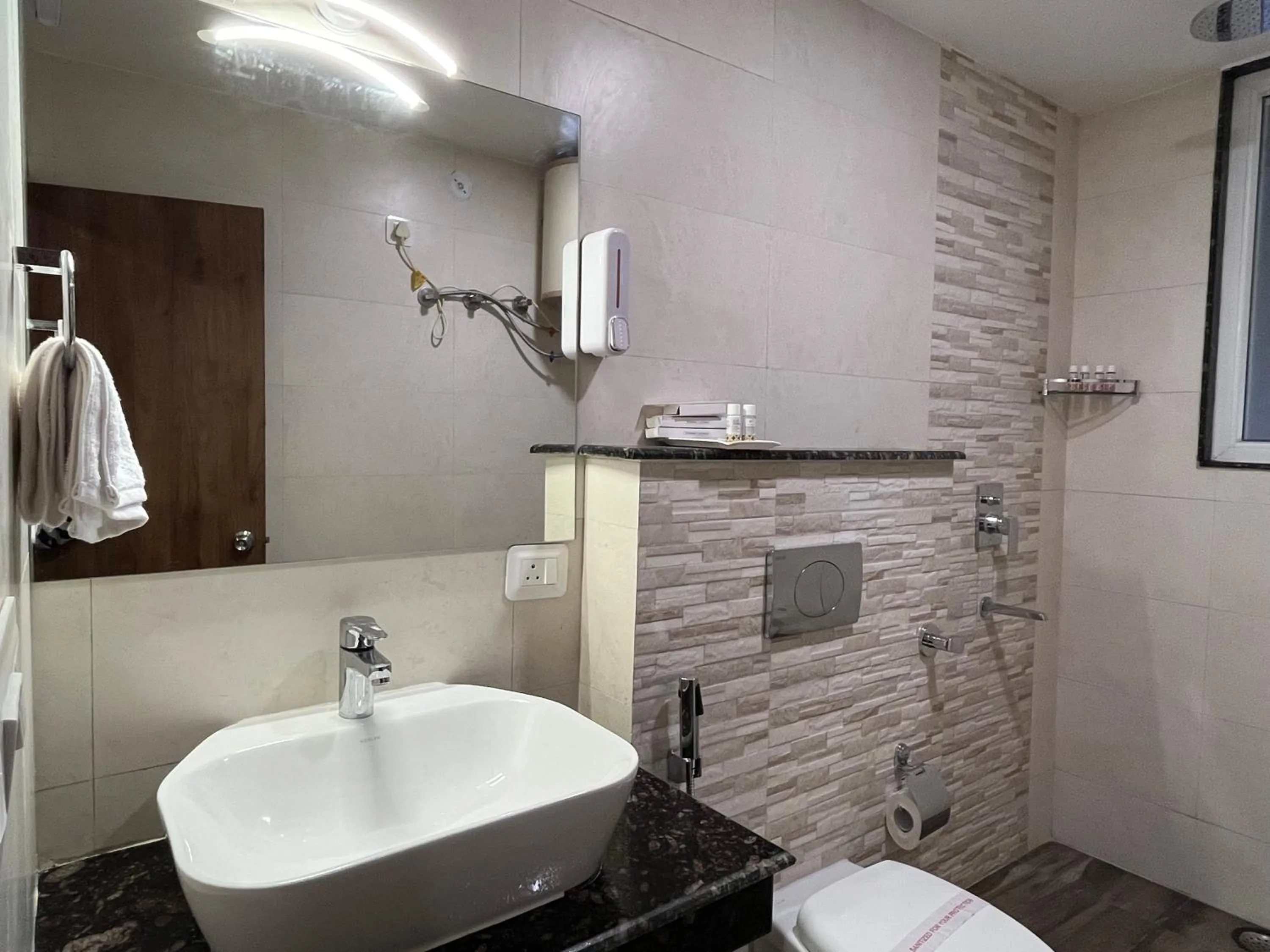 Bathroom in NIVEDAN HOTEL AND RESORT