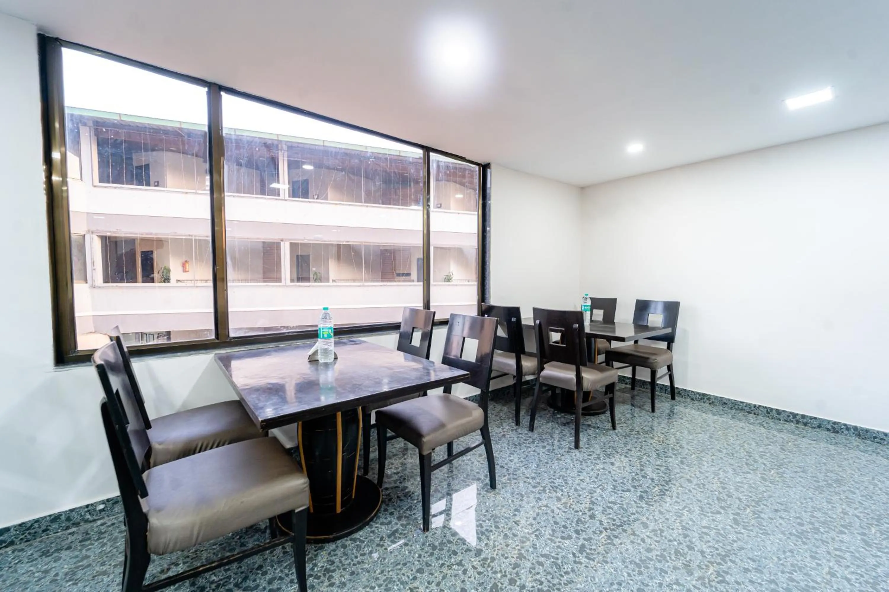 Dining area in Treebo Seven Days, Mahabaleshwar