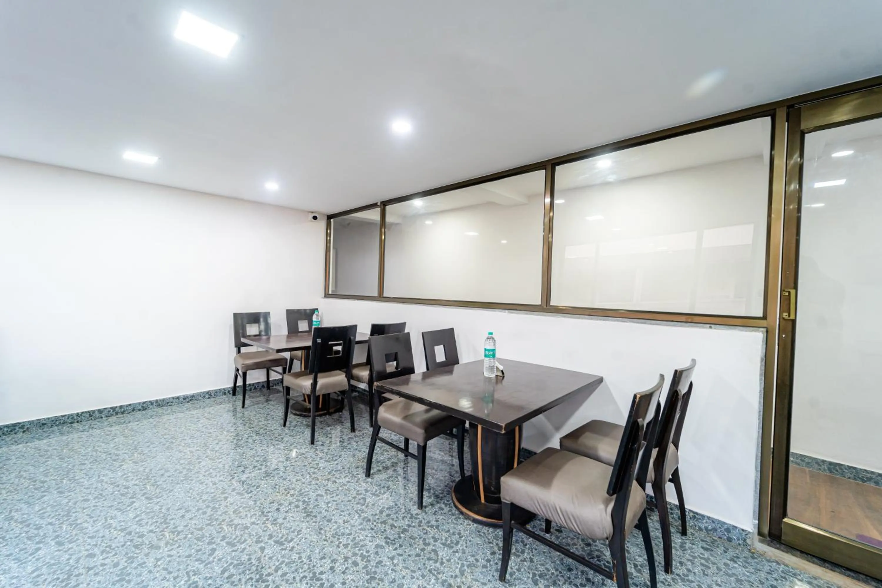 Dining area in Treebo Seven Days, Mahabaleshwar