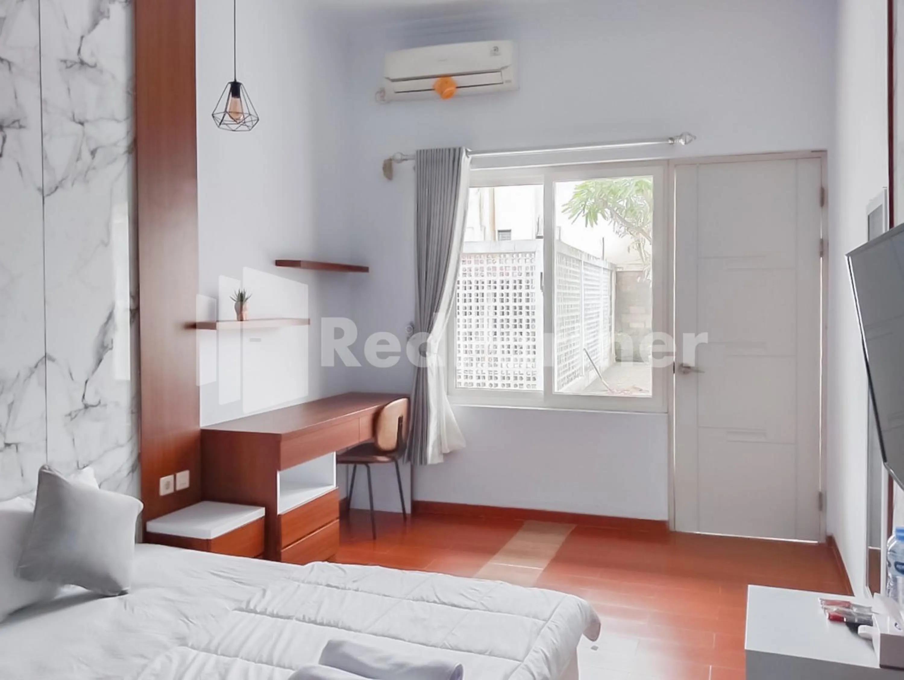 Bedroom, Bed in Khayrizsan Guest House Mitra RedDoorz