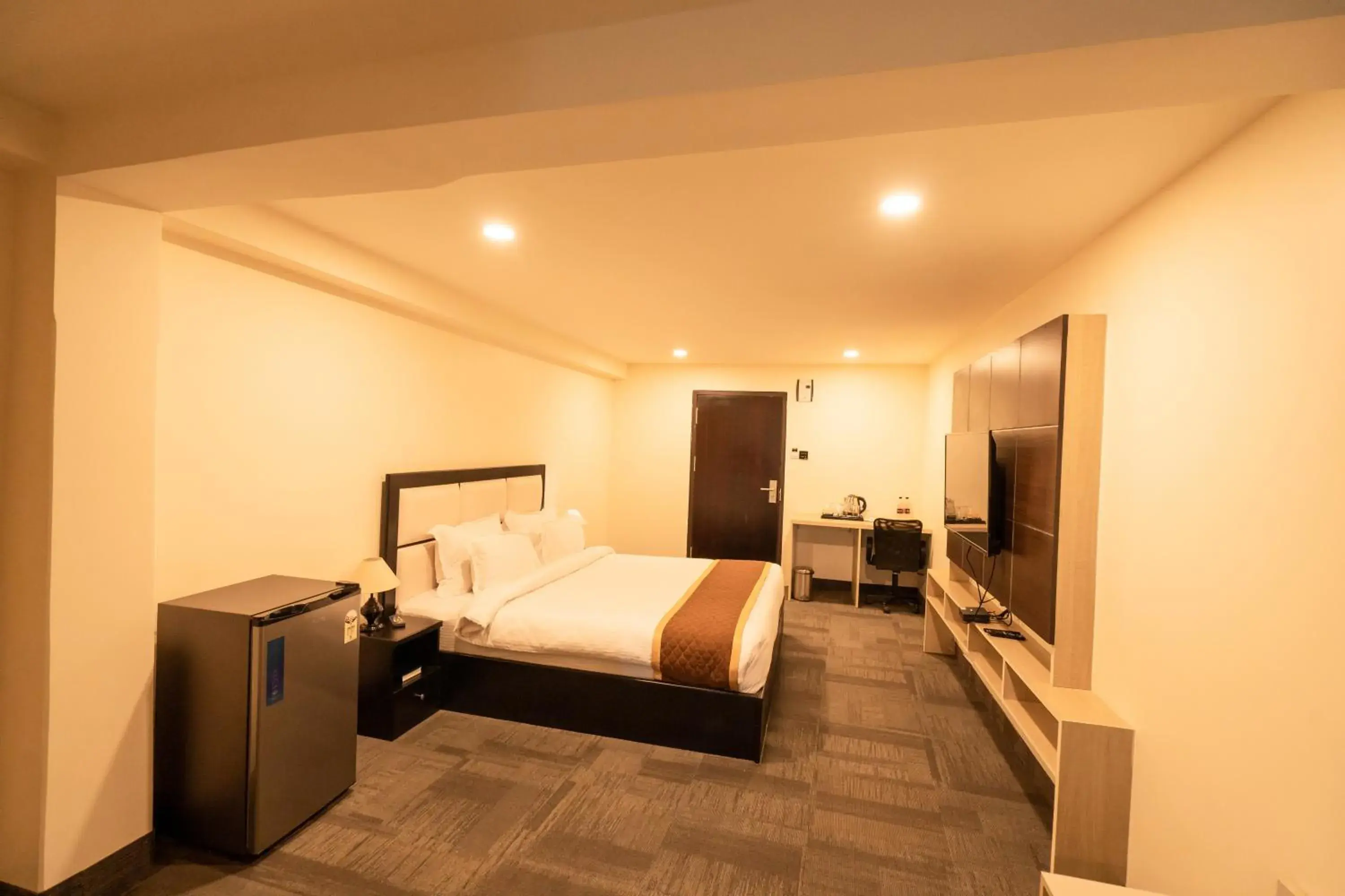 Communal lounge/ TV room, Bed in ROYALE LALAWI HOTEL Communal lounge/ TV room, Bed in ROYALE LALAWI HOTEL