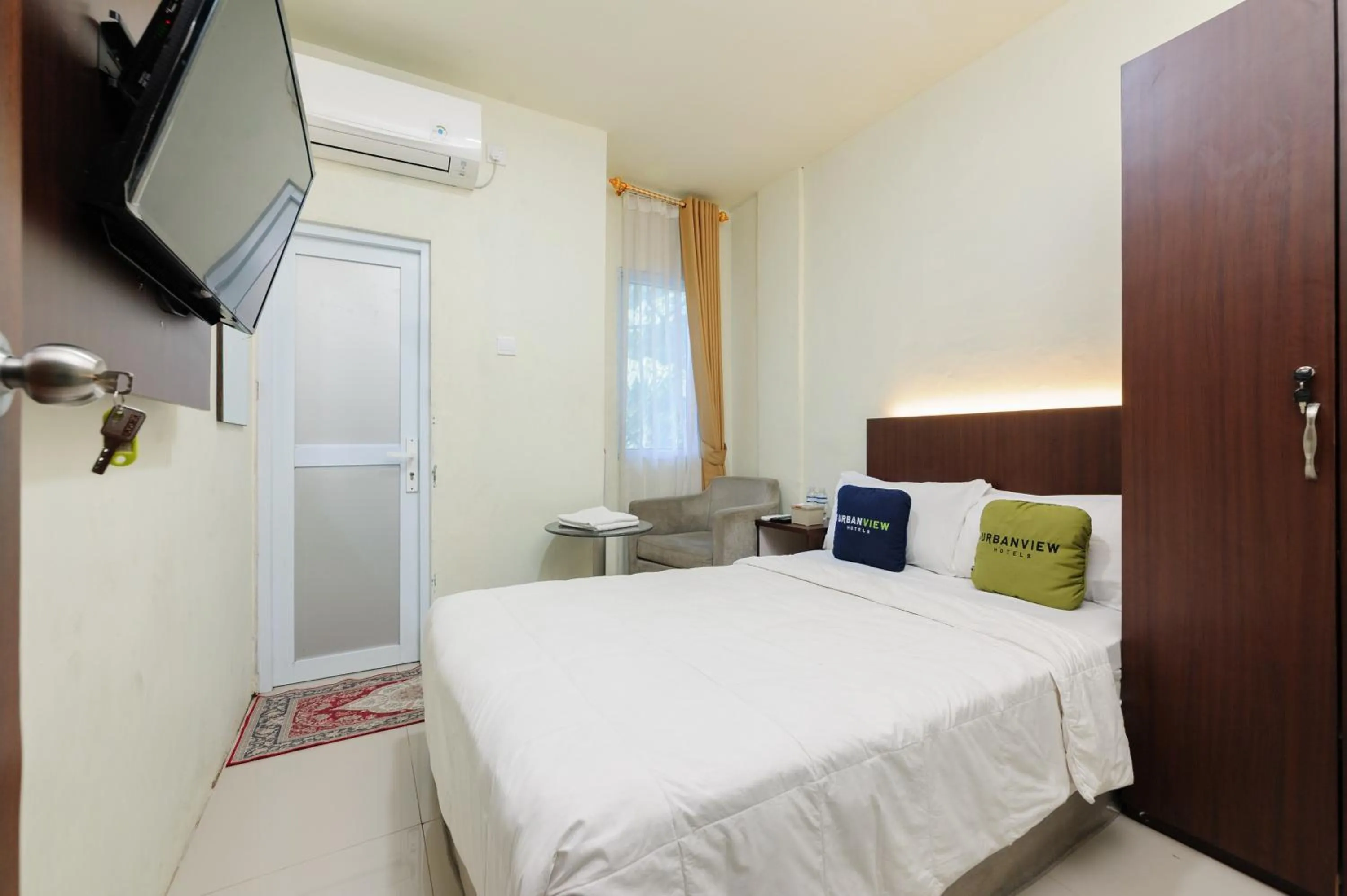 Bedroom, Bed in Urbanview Hotel Kansa near Harbour Bay Batam by RedDoorz