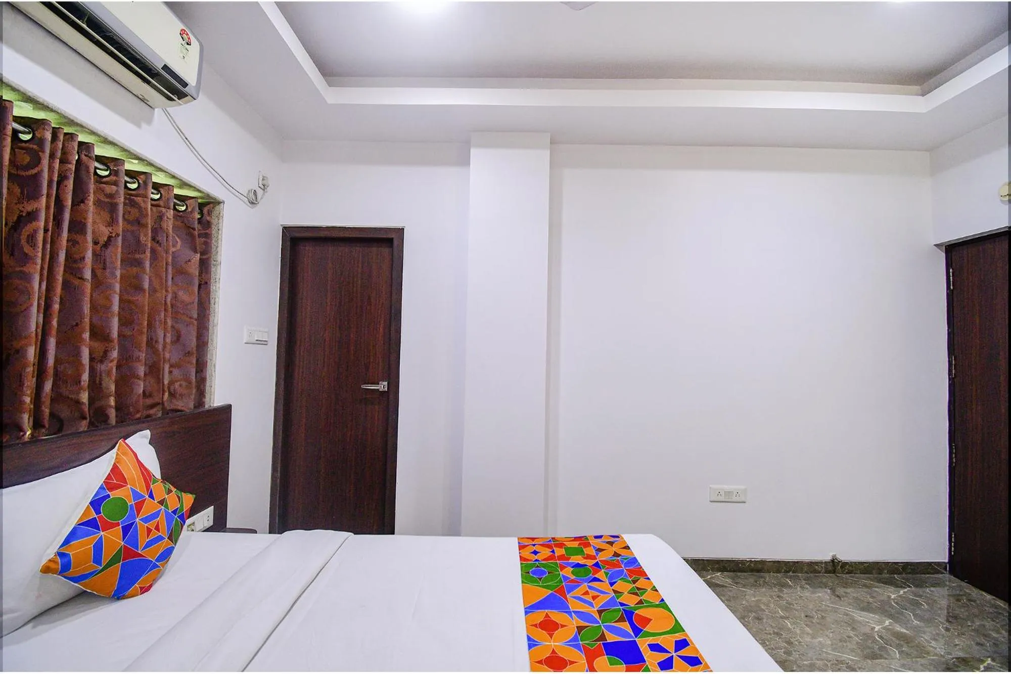 Bed in FabHotel Rani Tower - Chinar Park