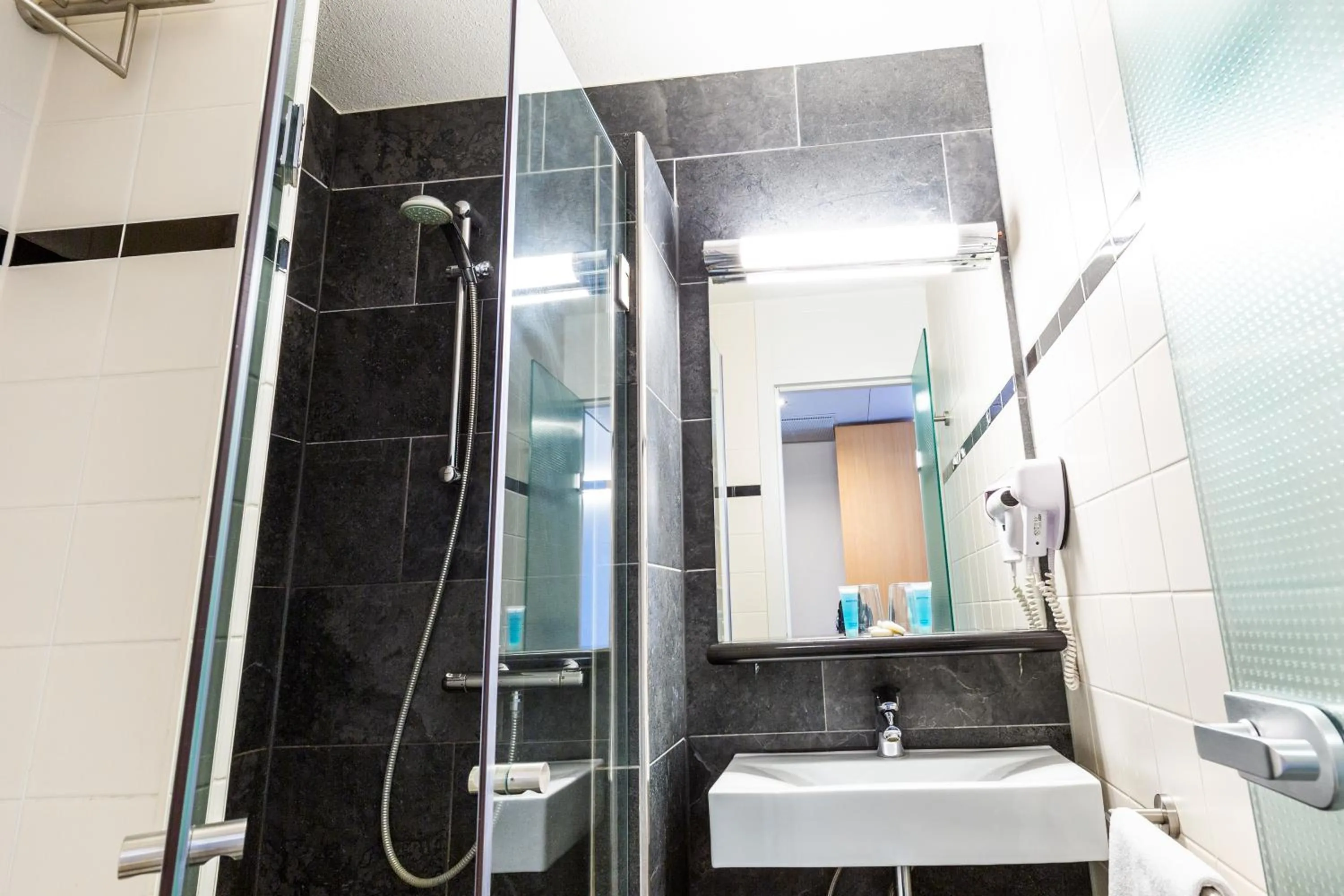 Bathroom in Bastion Hotel Breda