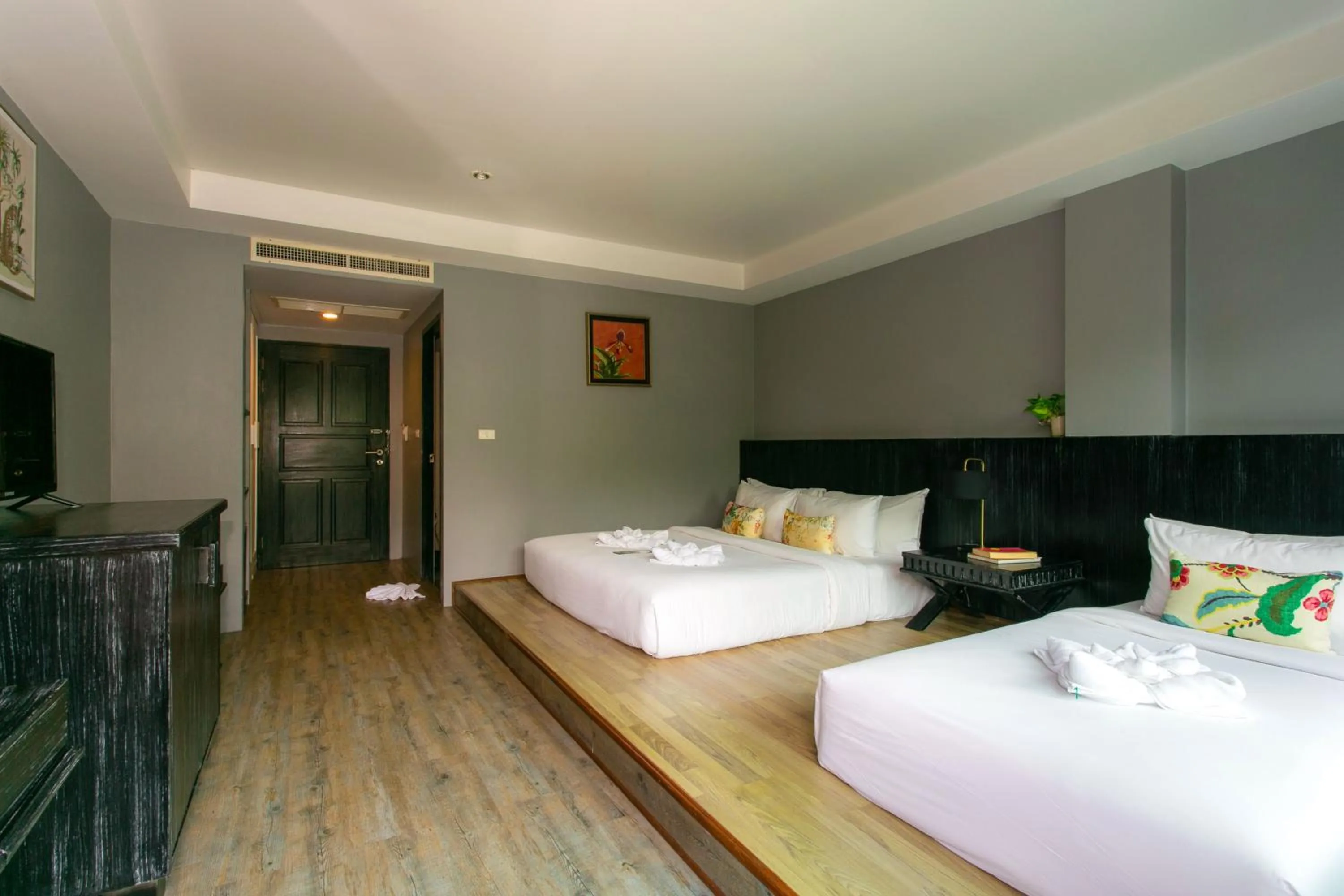 Bed in JALMIN Hotel Samui