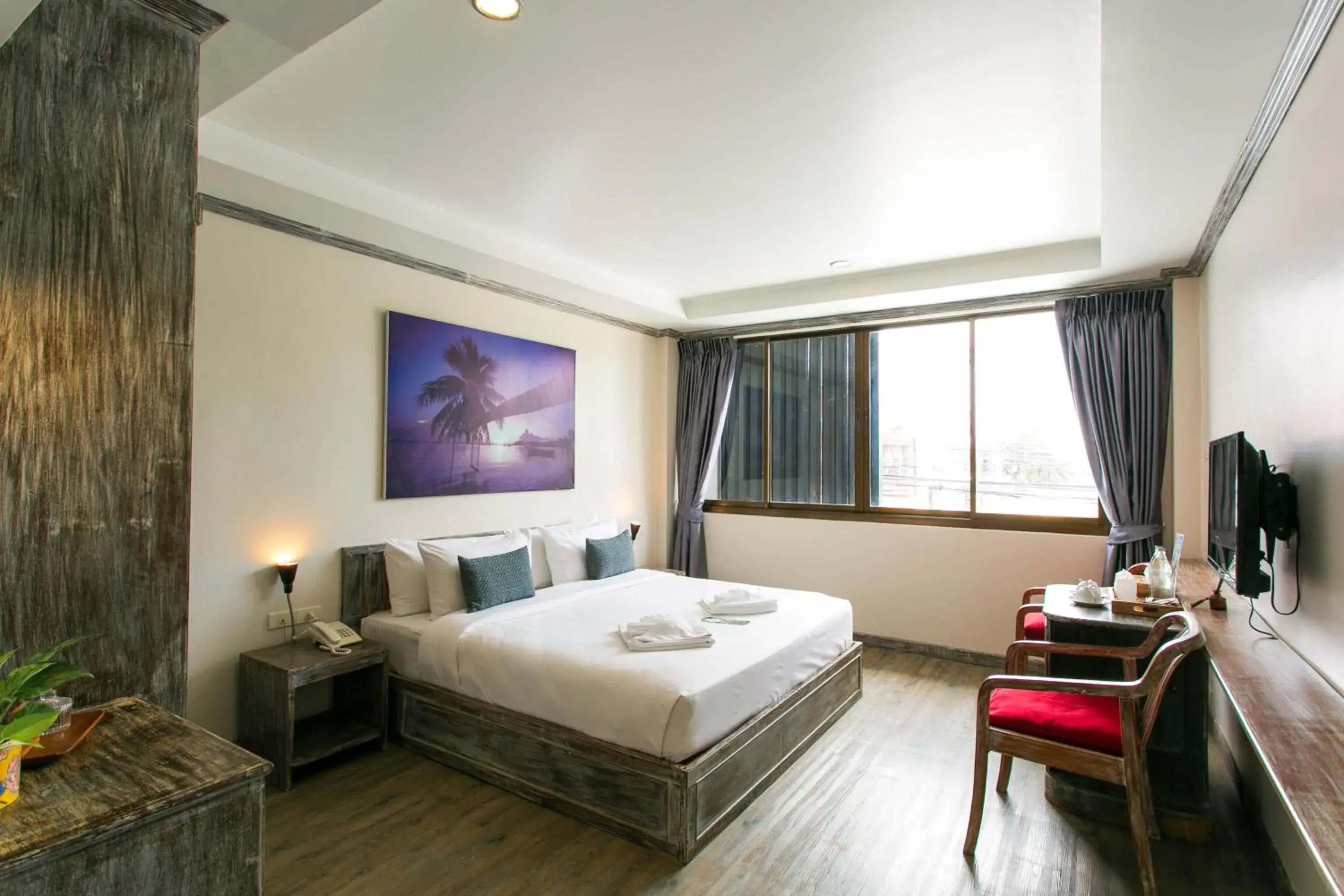 Bed in JALMIN Hotel Samui Bed in JALMIN Hotel Samui