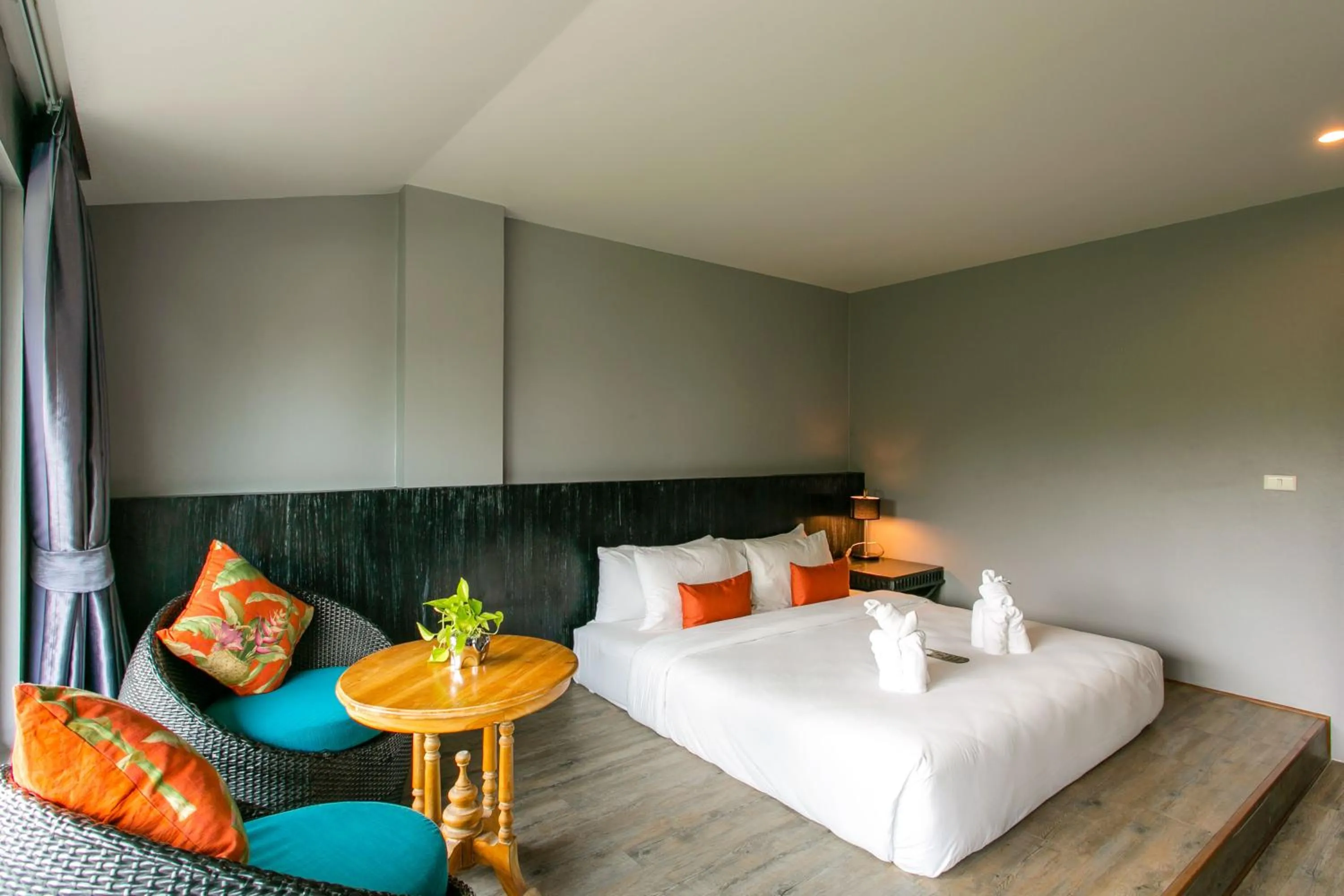 Bed in JALMIN Hotel Samui