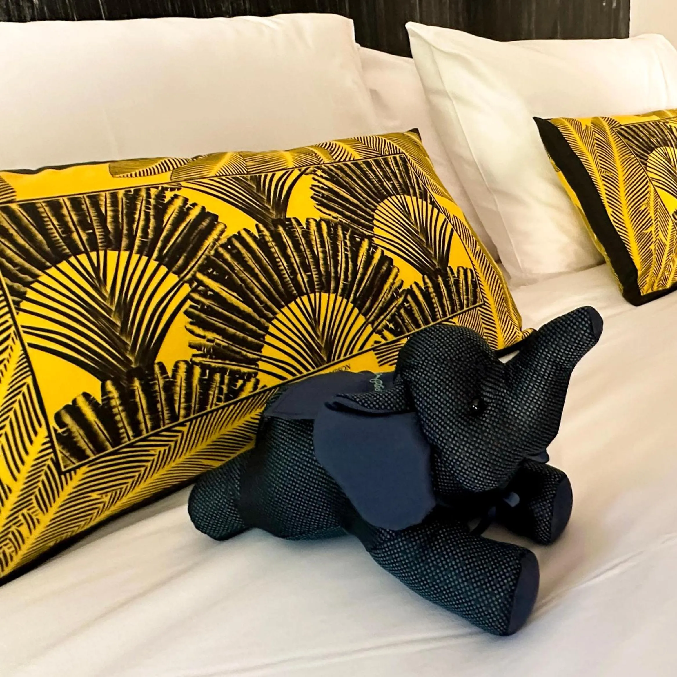 Bed in JALMIN Hotel Samui