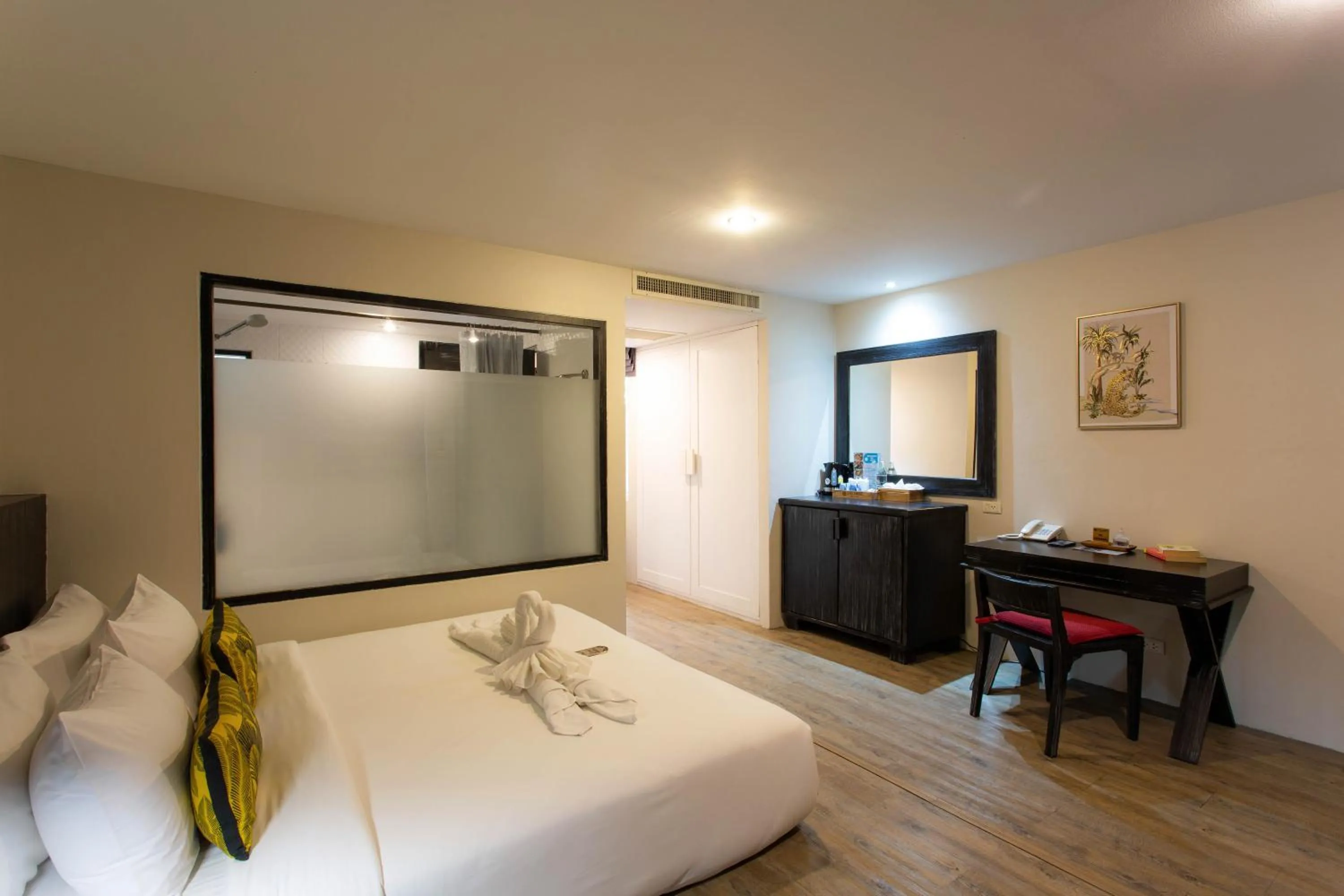 Bed in JALMIN Hotel Samui