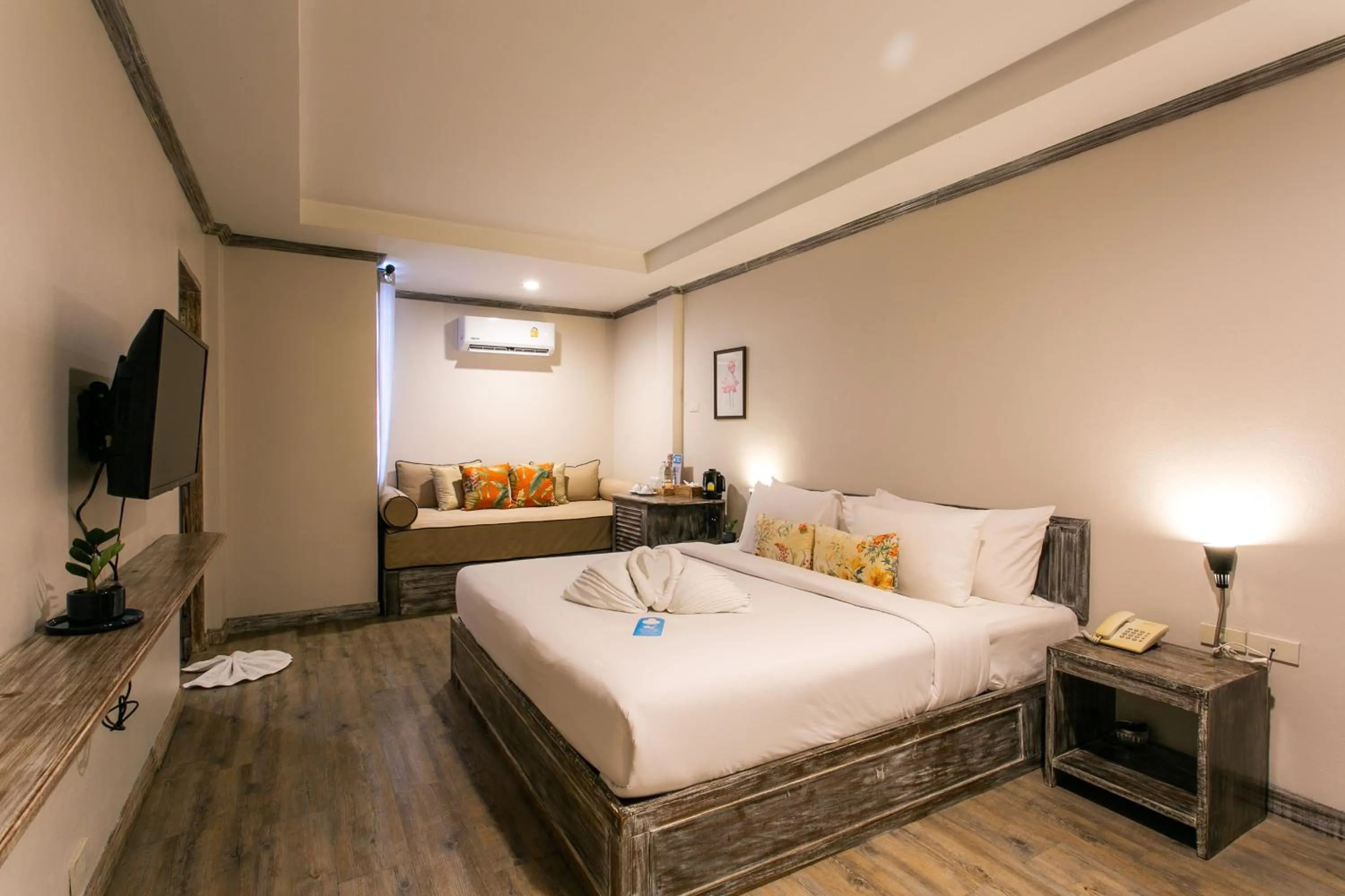 Bed in JALMIN Hotel Samui