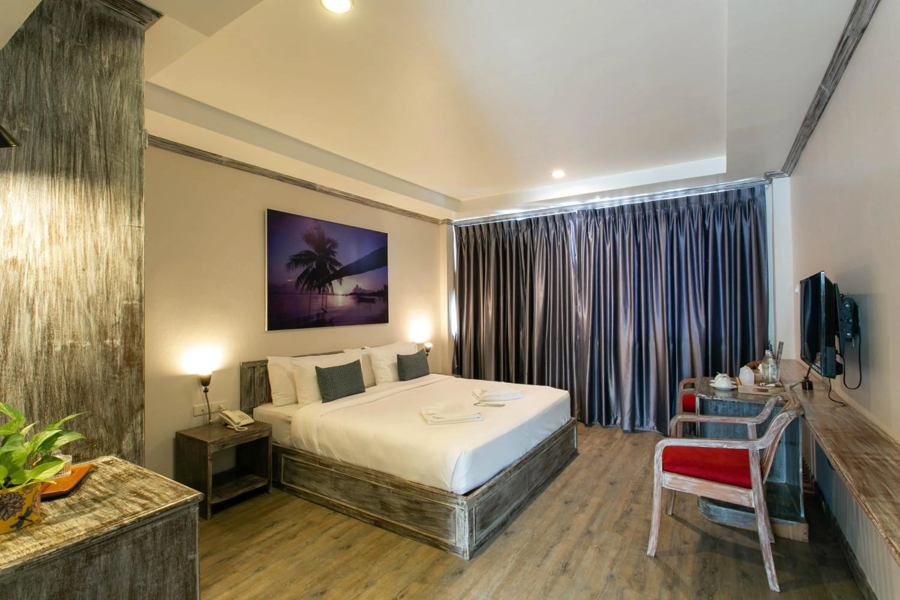 Bed in JALMIN Hotel Samui