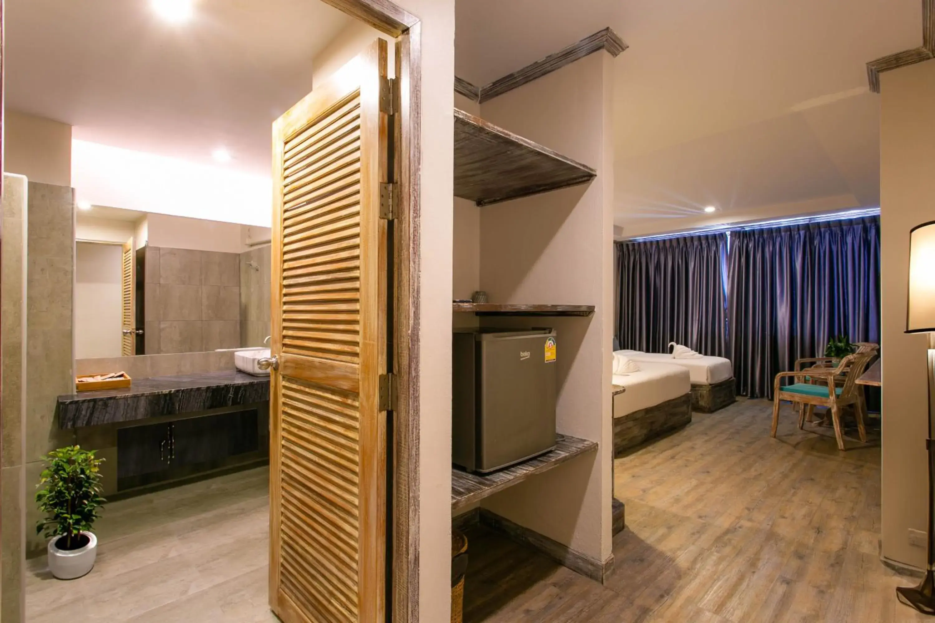 Bed in JALMIN Hotel Samui Bed in JALMIN Hotel Samui