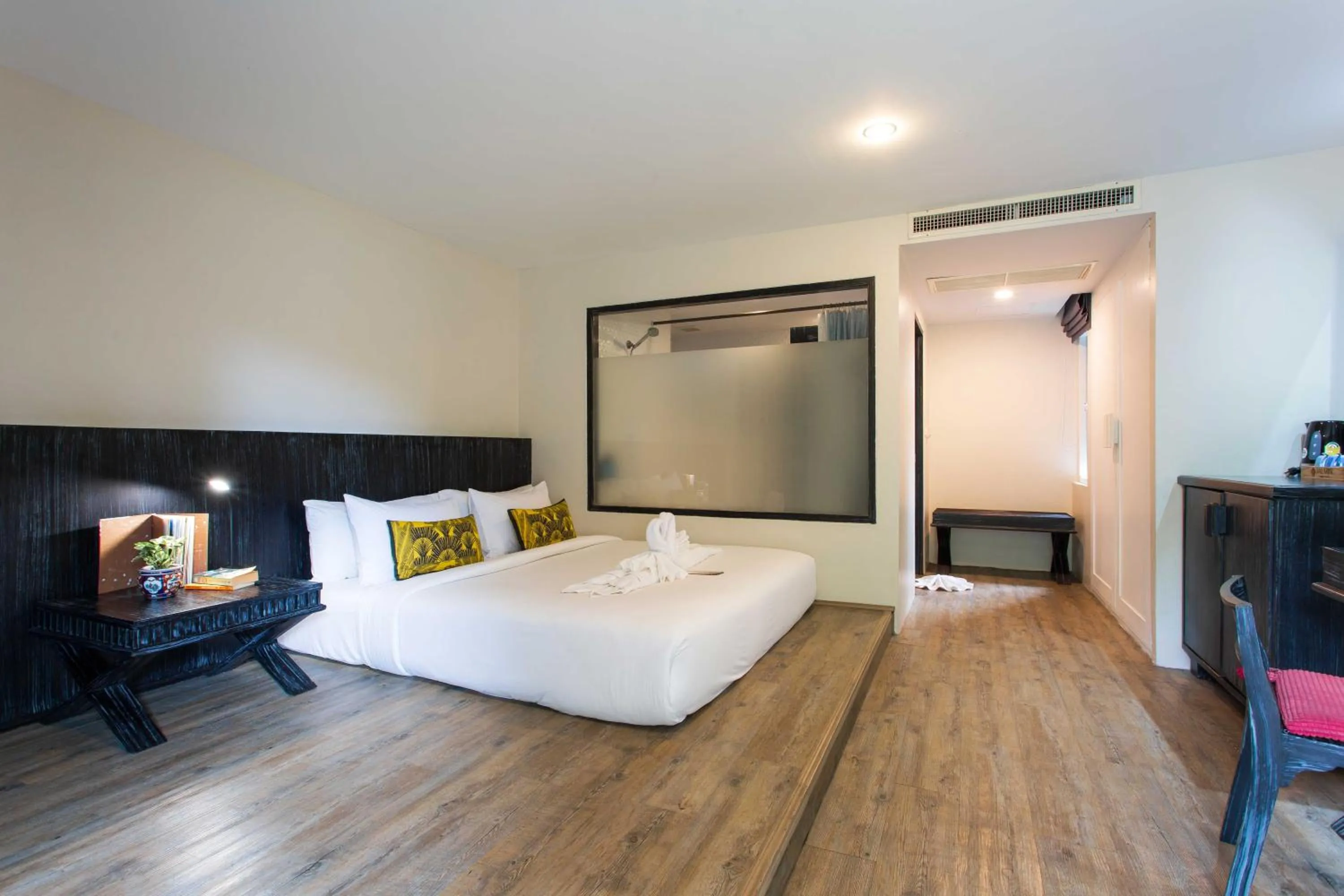 Bed in JALMIN Hotel Samui