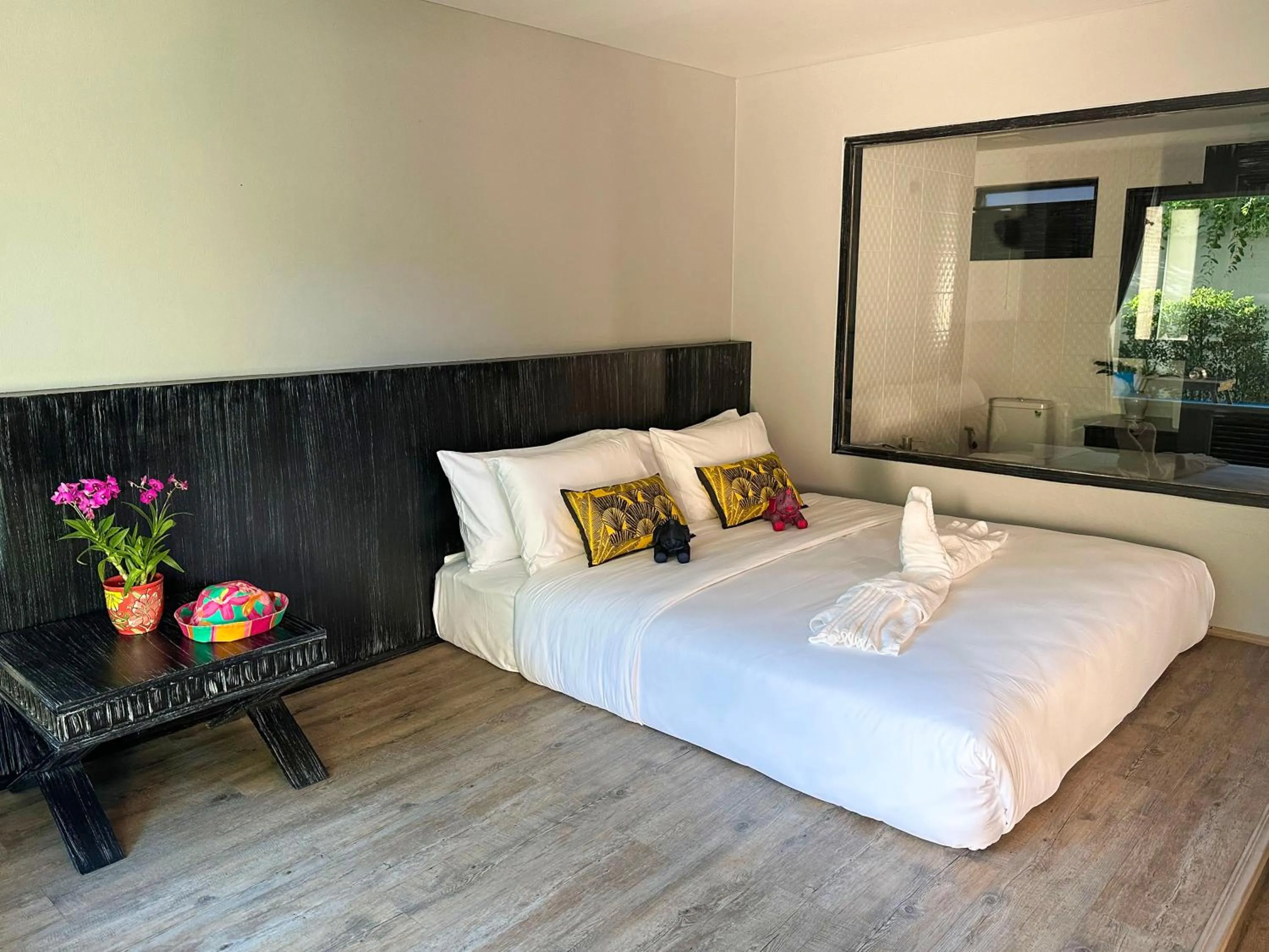 Bed in JALMIN Hotel Samui