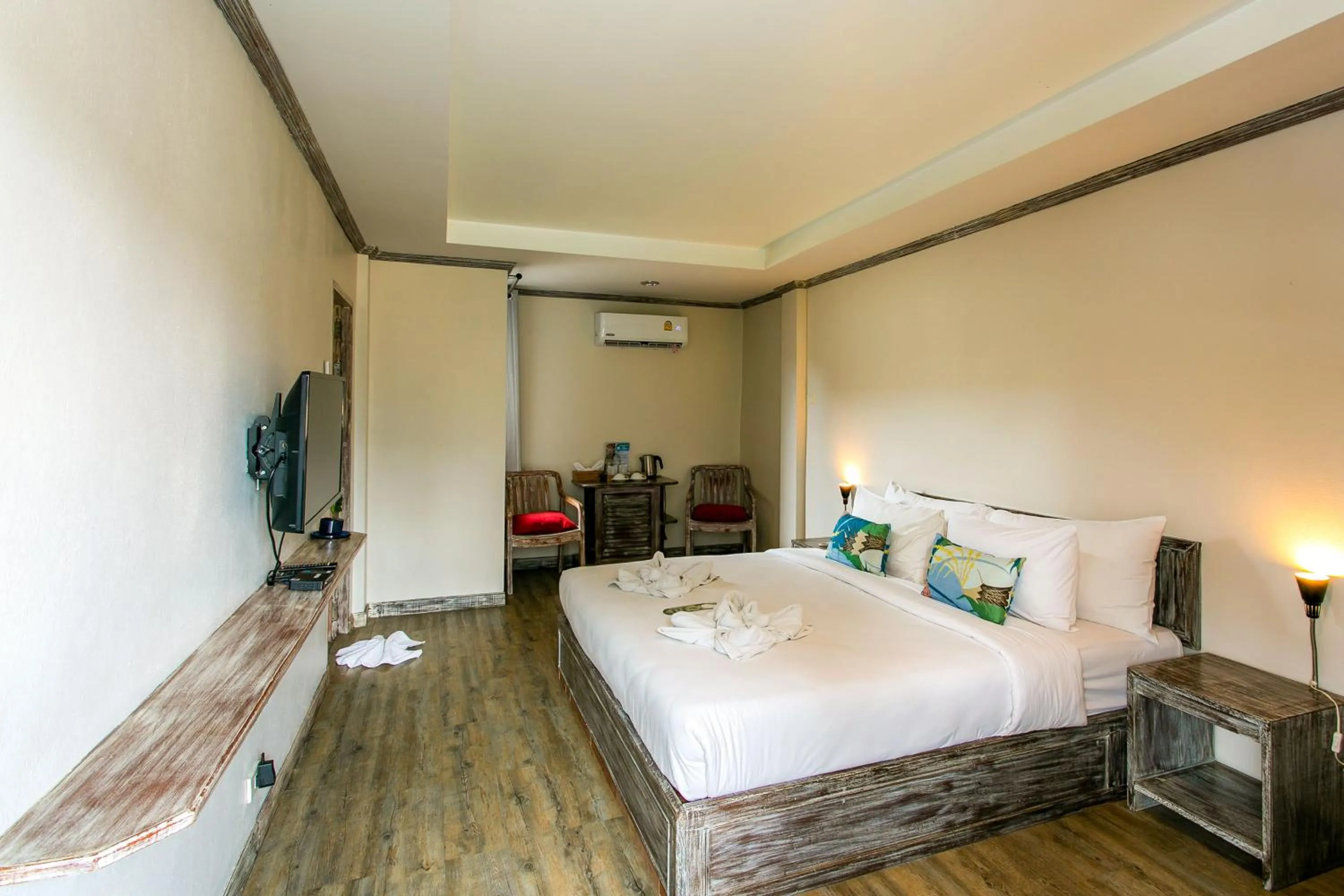 Bed in JALMIN Hotel Samui