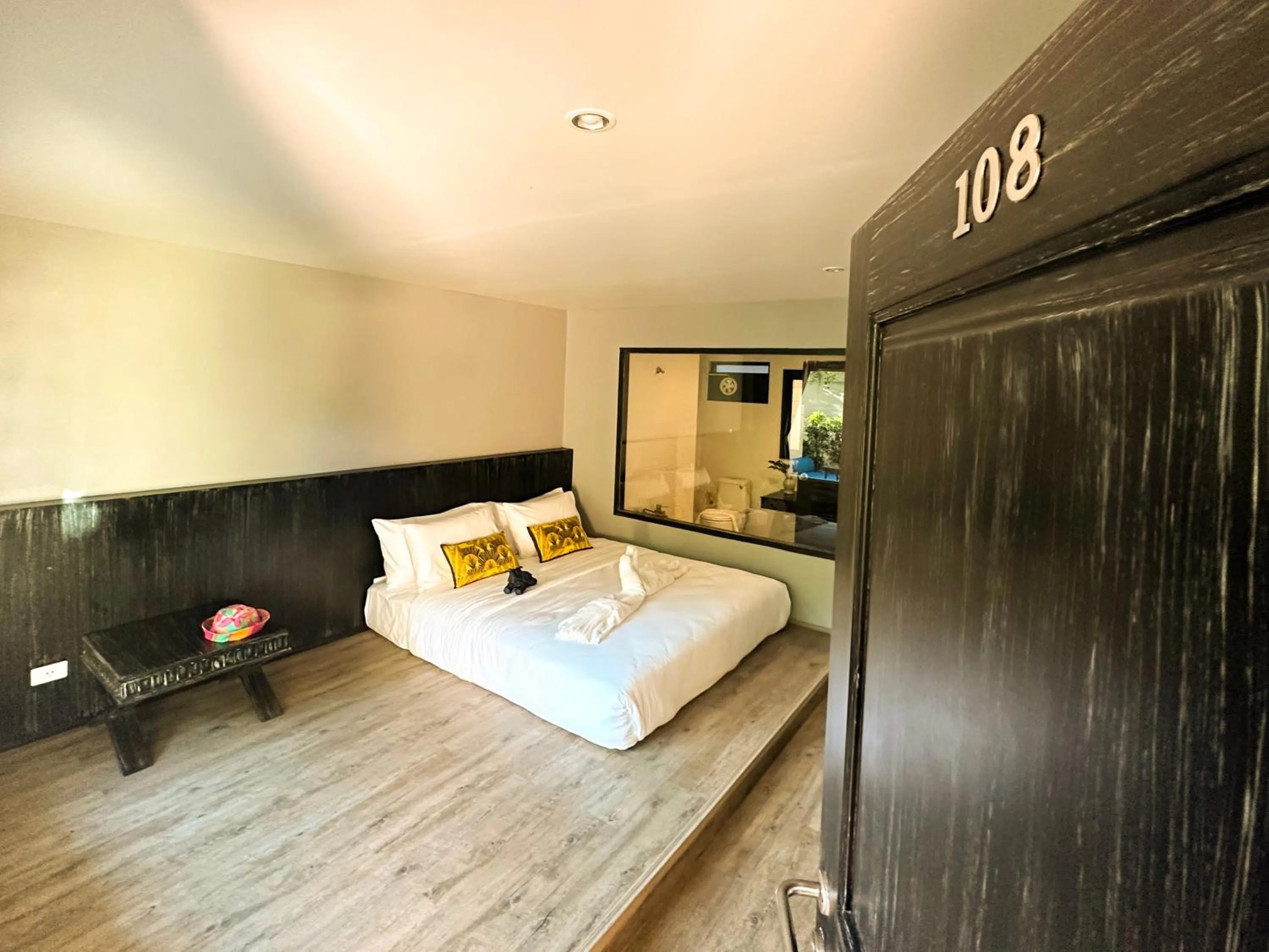 Bed in JALMIN Hotel Samui