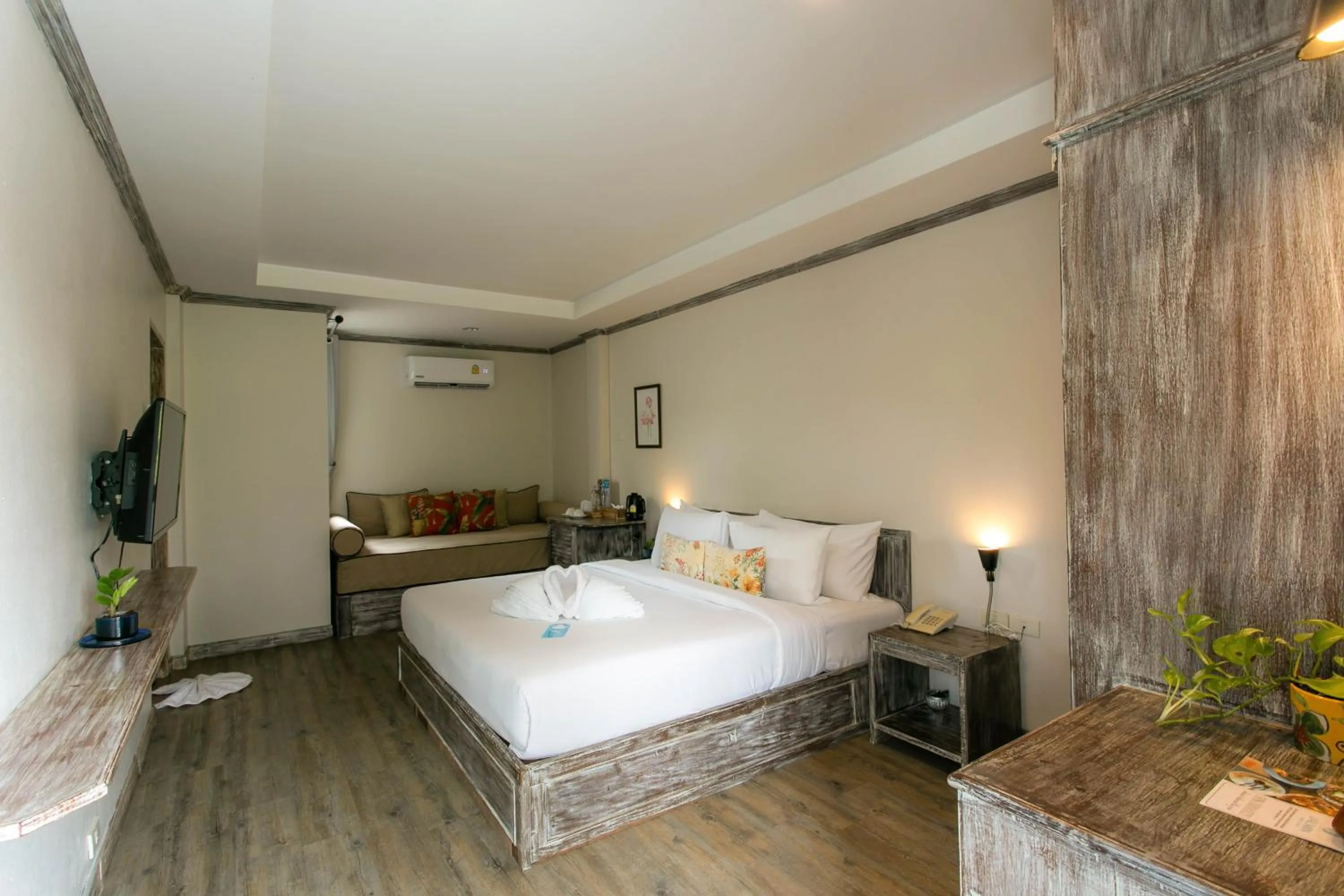 Bed in JALMIN Hotel Samui