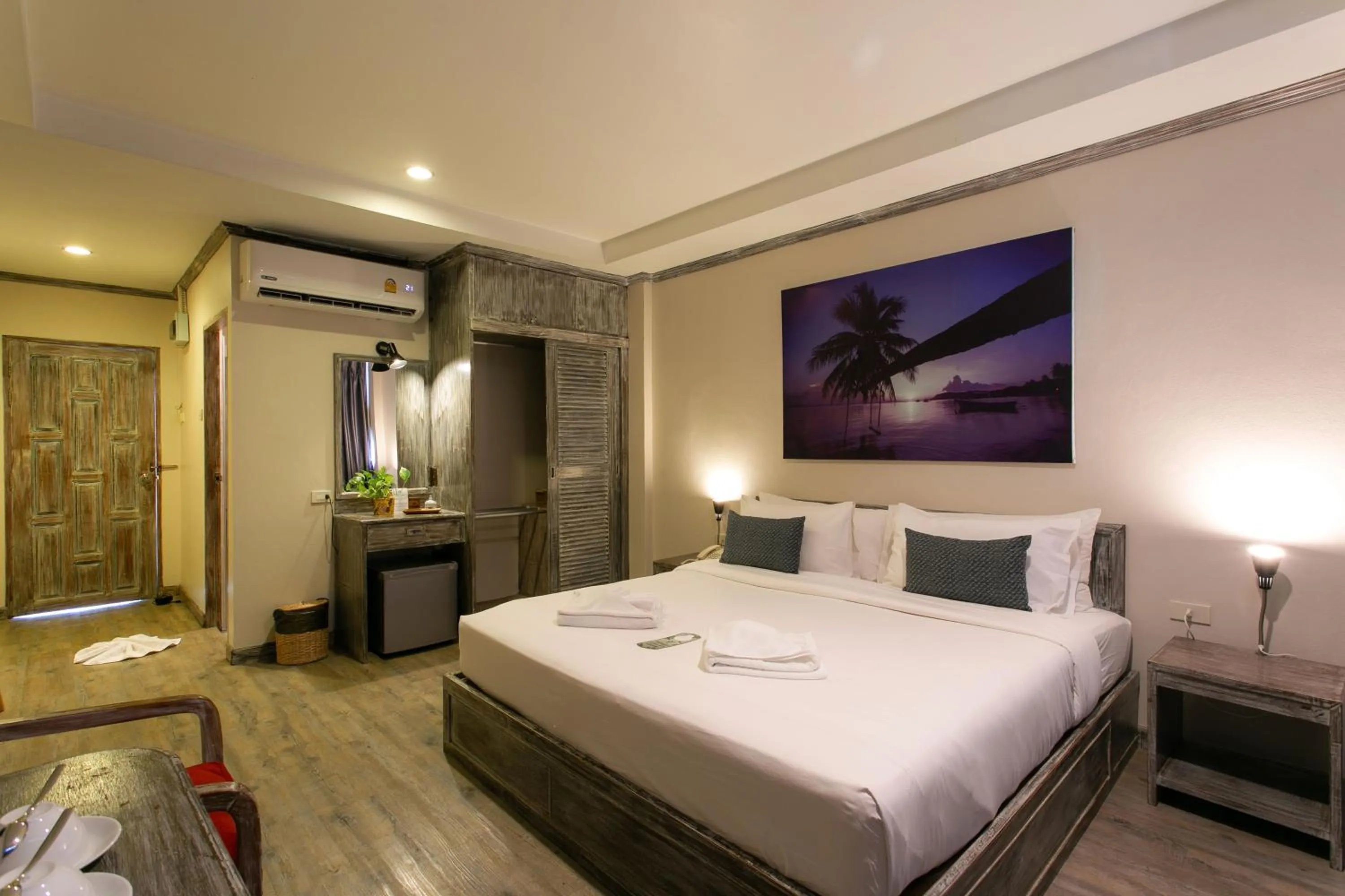 Bed in JALMIN Hotel Samui