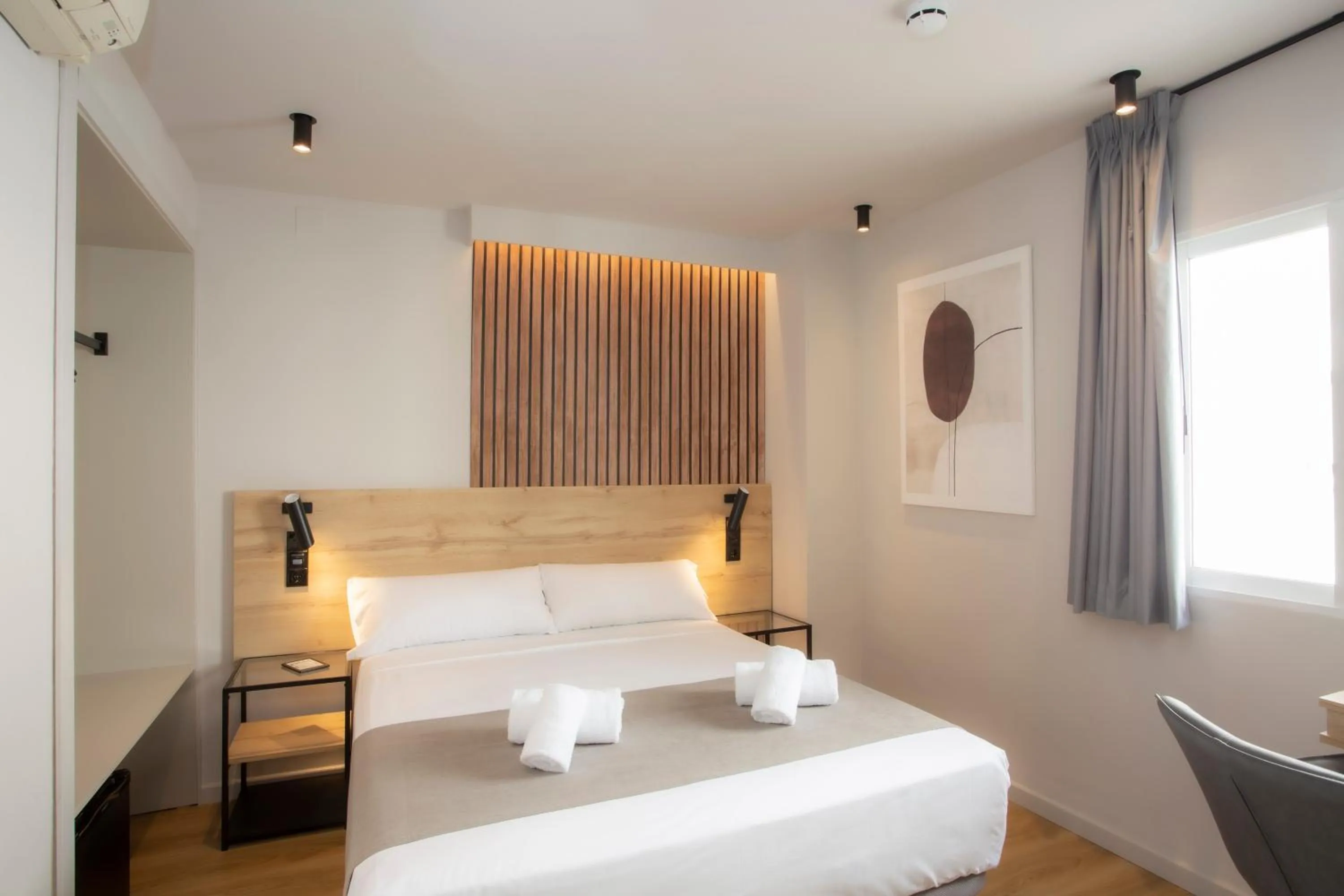 Bed in Aila II Hotel Boutique by SingularStays - Digital Access