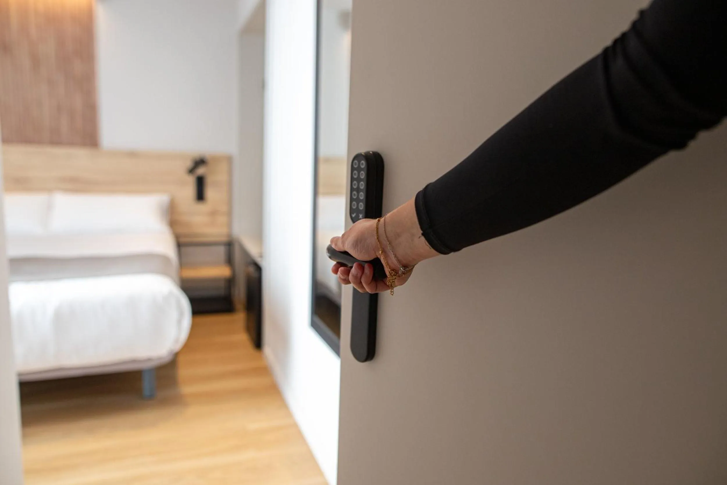 Bed in Aila II Hotel Boutique by SingularStays - Digital Access