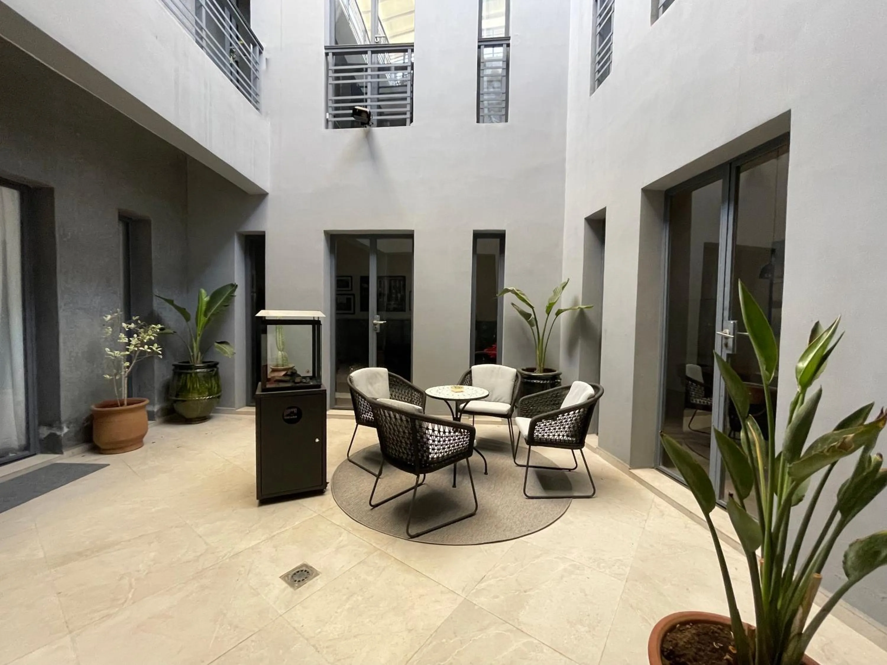 Communal lounge/ TV room in YVES Marrakech