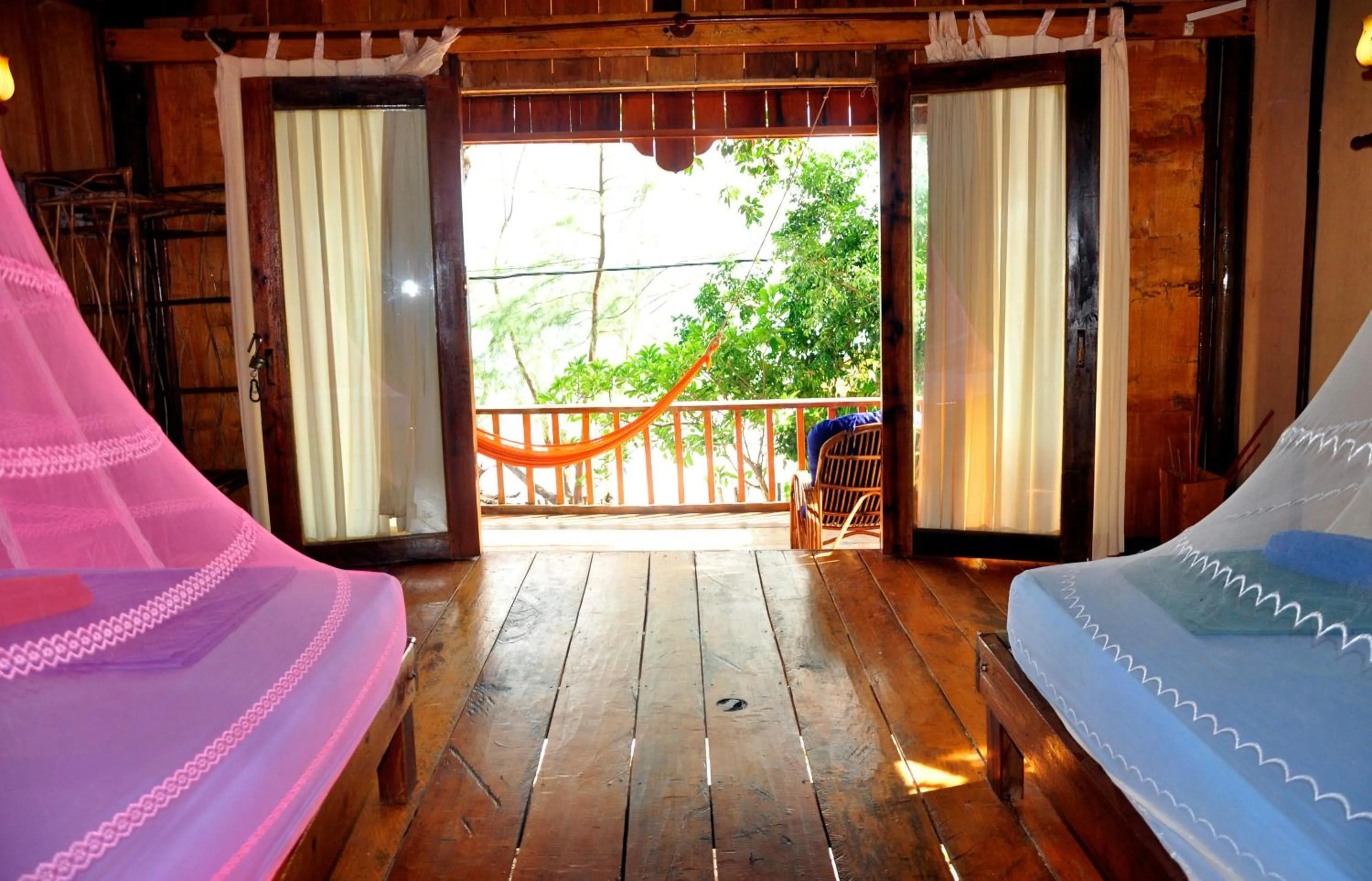 Bed in White Beach Bungalows