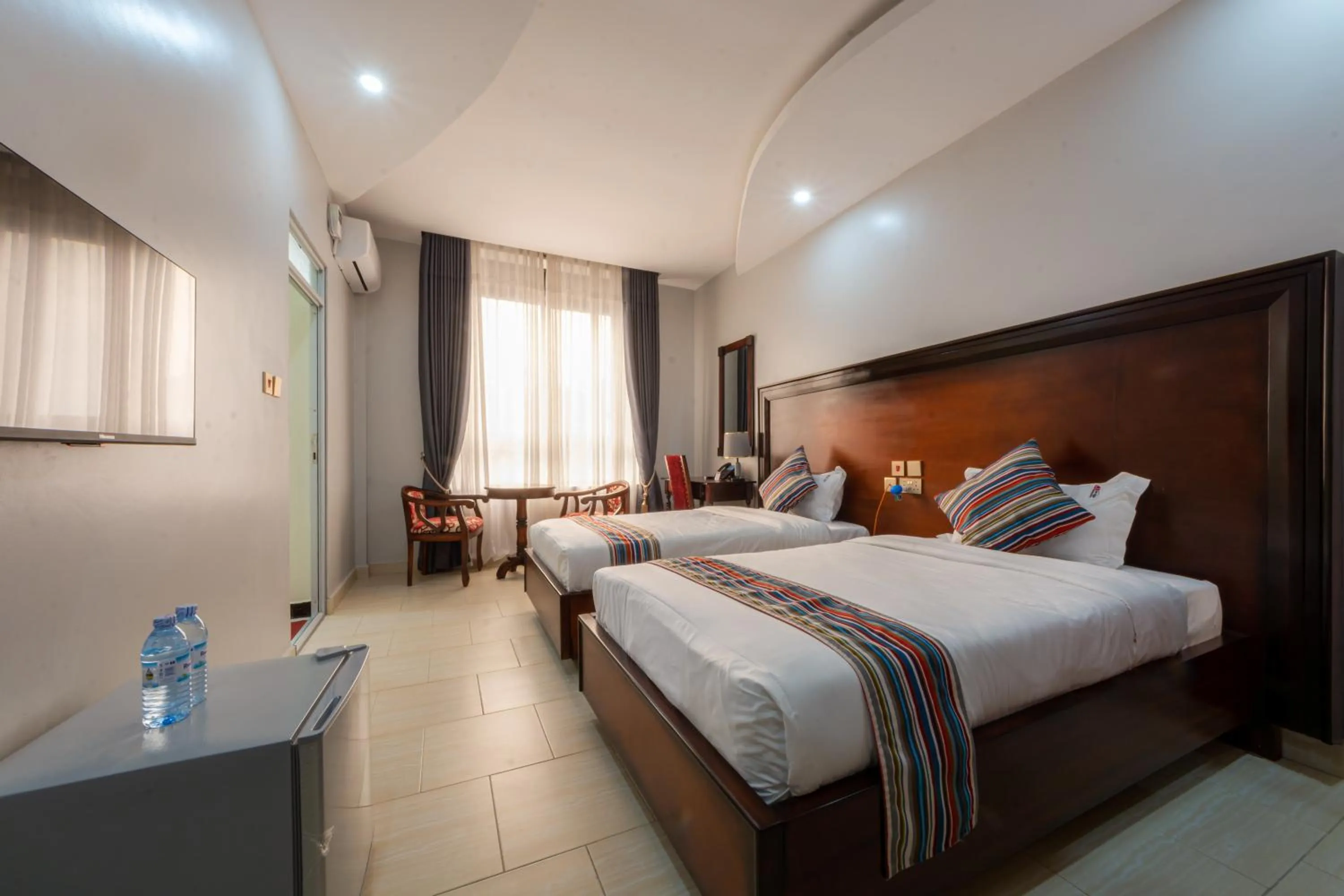 TV and multimedia, Bed in Las Vegas Garden Hotel Mbarara