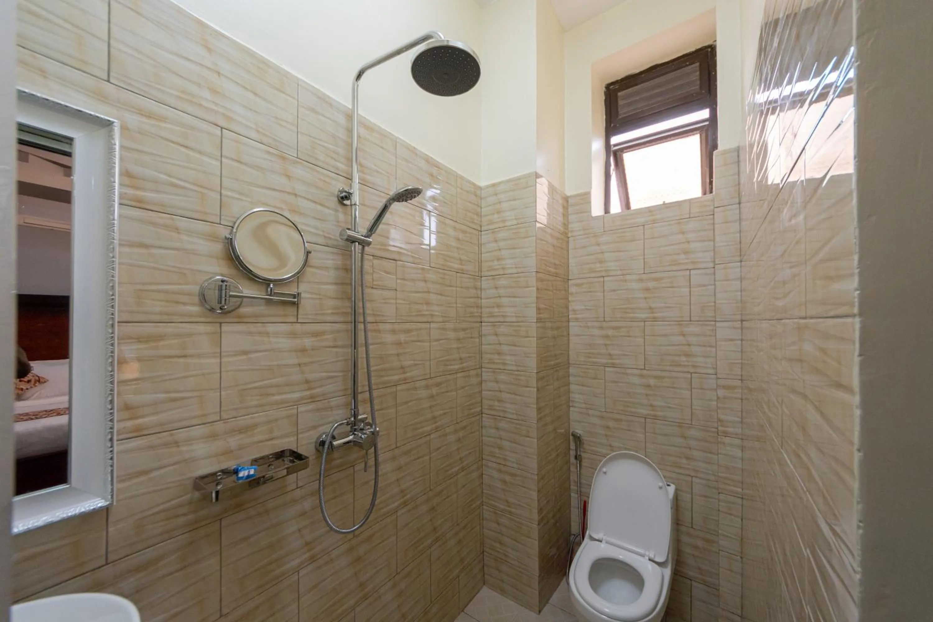 Shower in Las Vegas Garden Hotel Mbarara