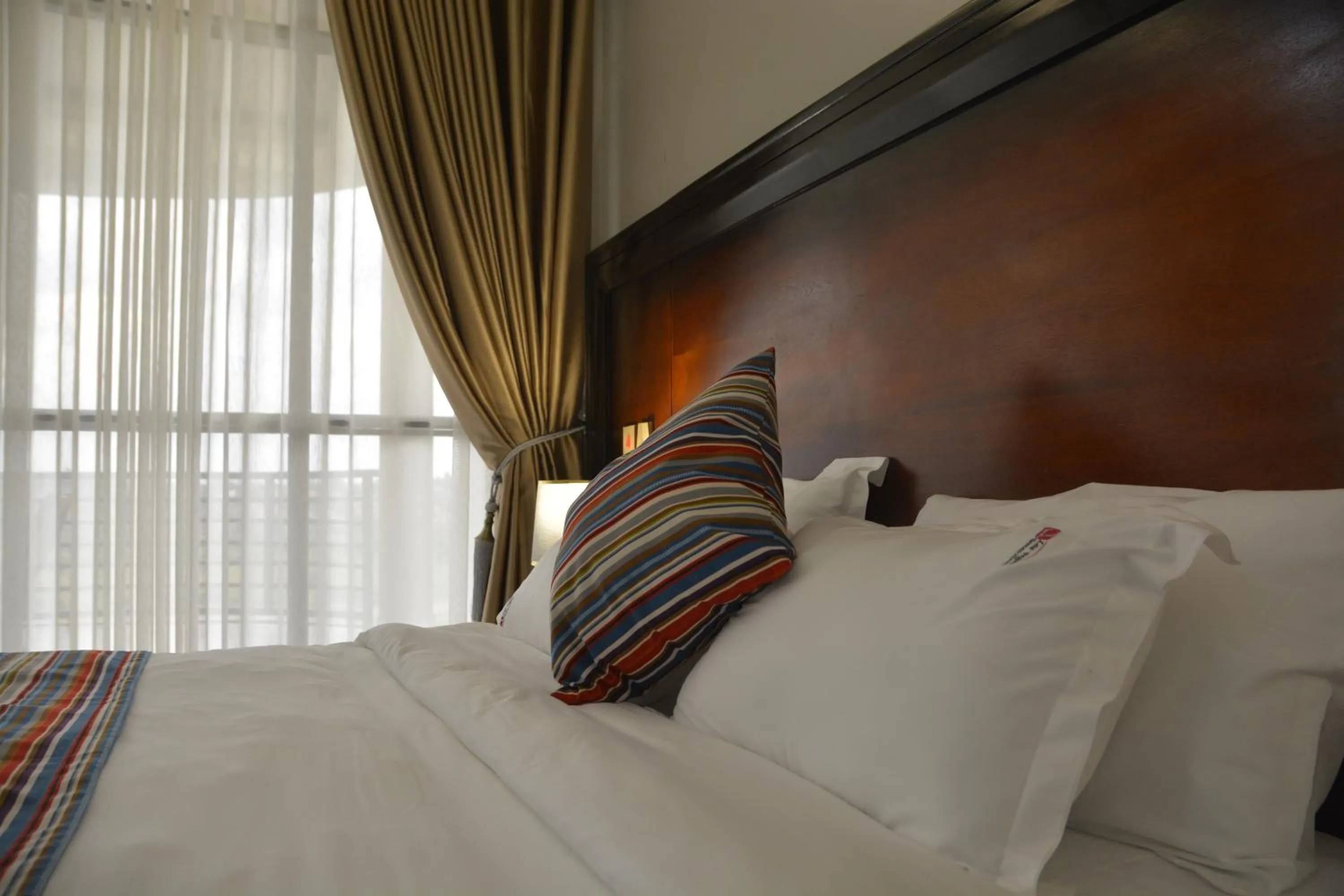 Bed in Las Vegas Garden Hotel Mbarara